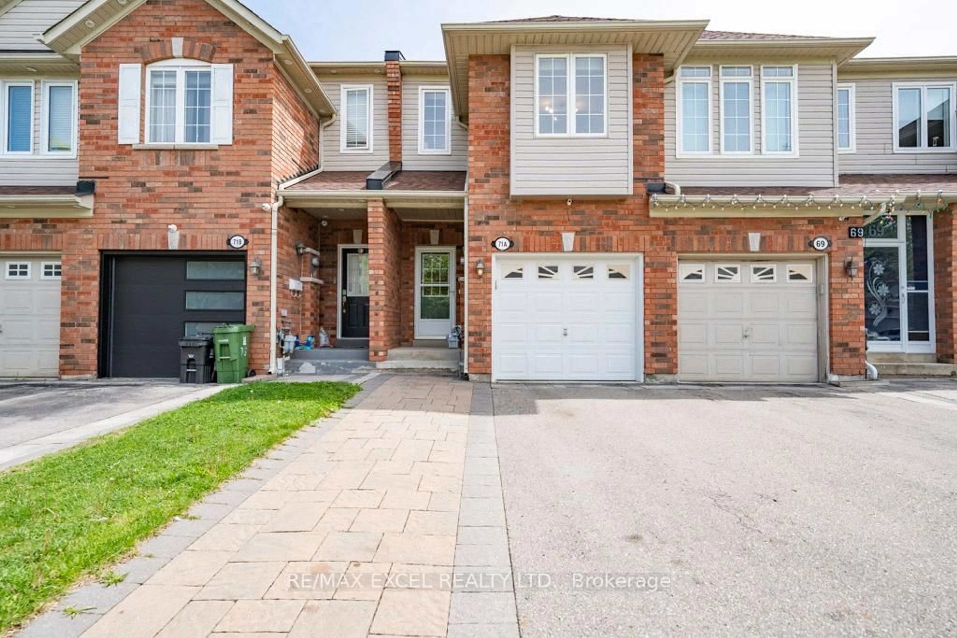 Home with brick exterior material, street for 71A Montezuma Tr, Toronto Ontario M1V 1K4
