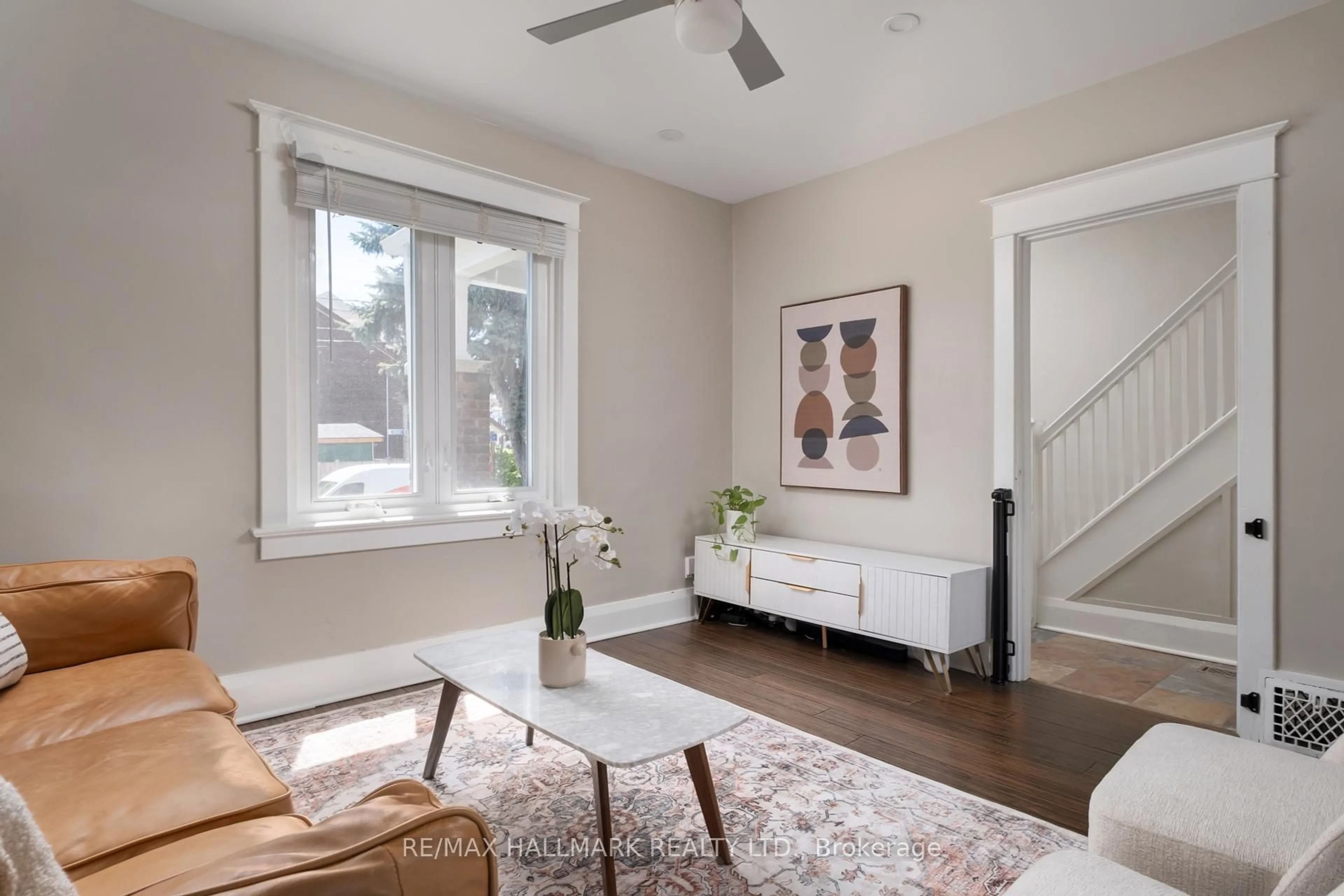 Living room with furniture, unknown for 2A Midburn Ave, Toronto Ontario M4C 2C9