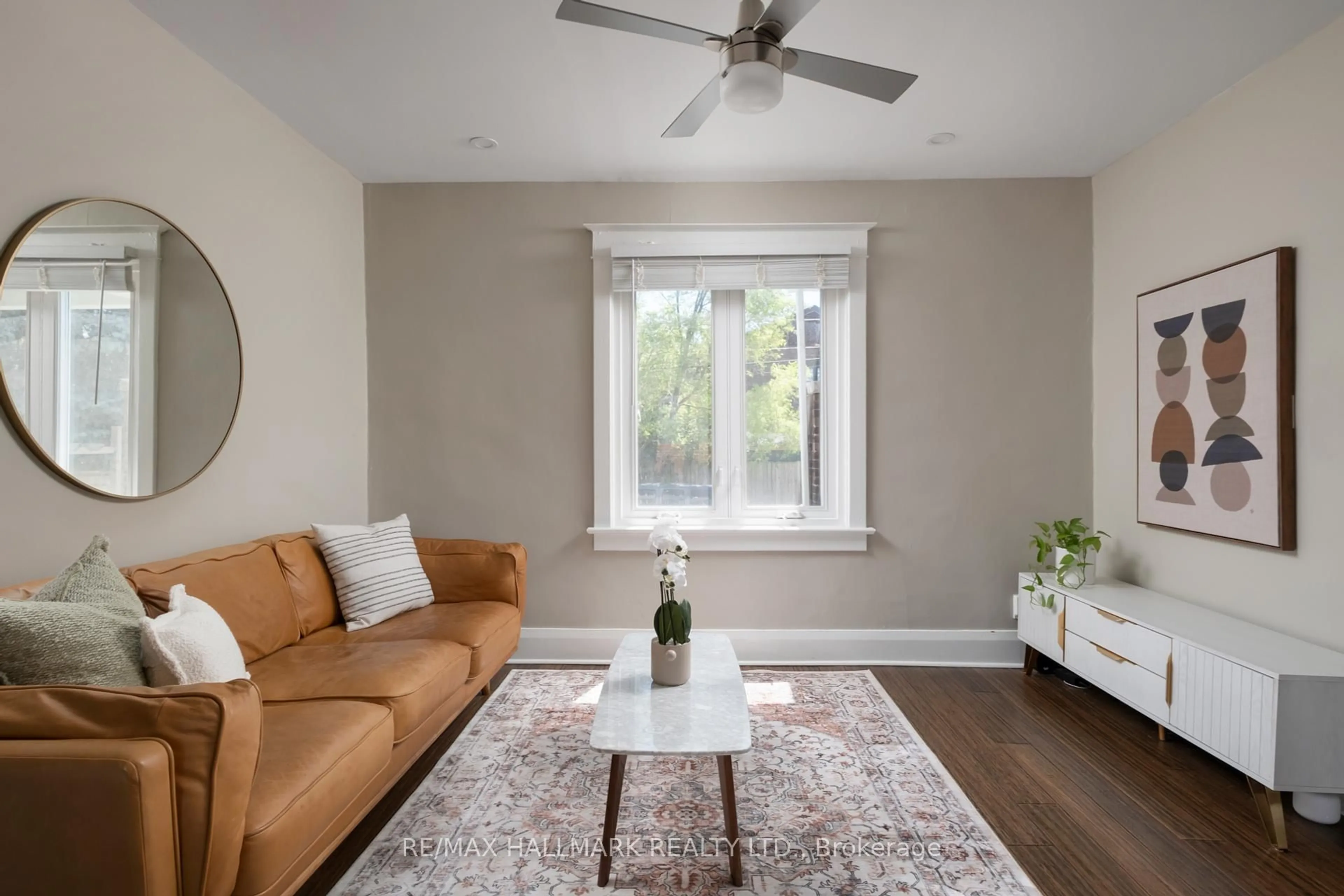 Living room with furniture, unknown for 2A Midburn Ave, Toronto Ontario M4C 2C9