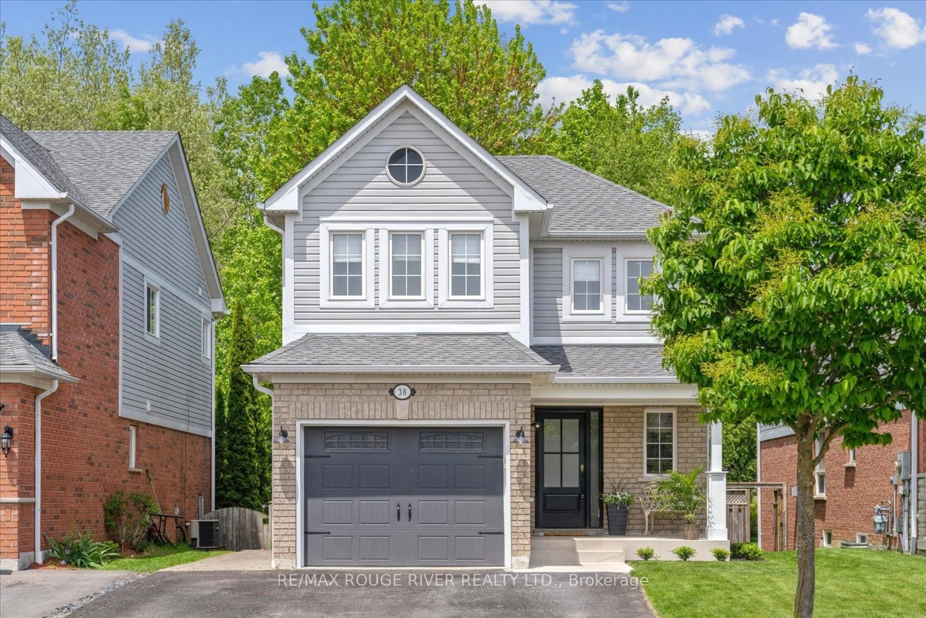 Home with brick exterior material, street for 38 Solmar Ave, Whitby Ontario L1R 2Z6