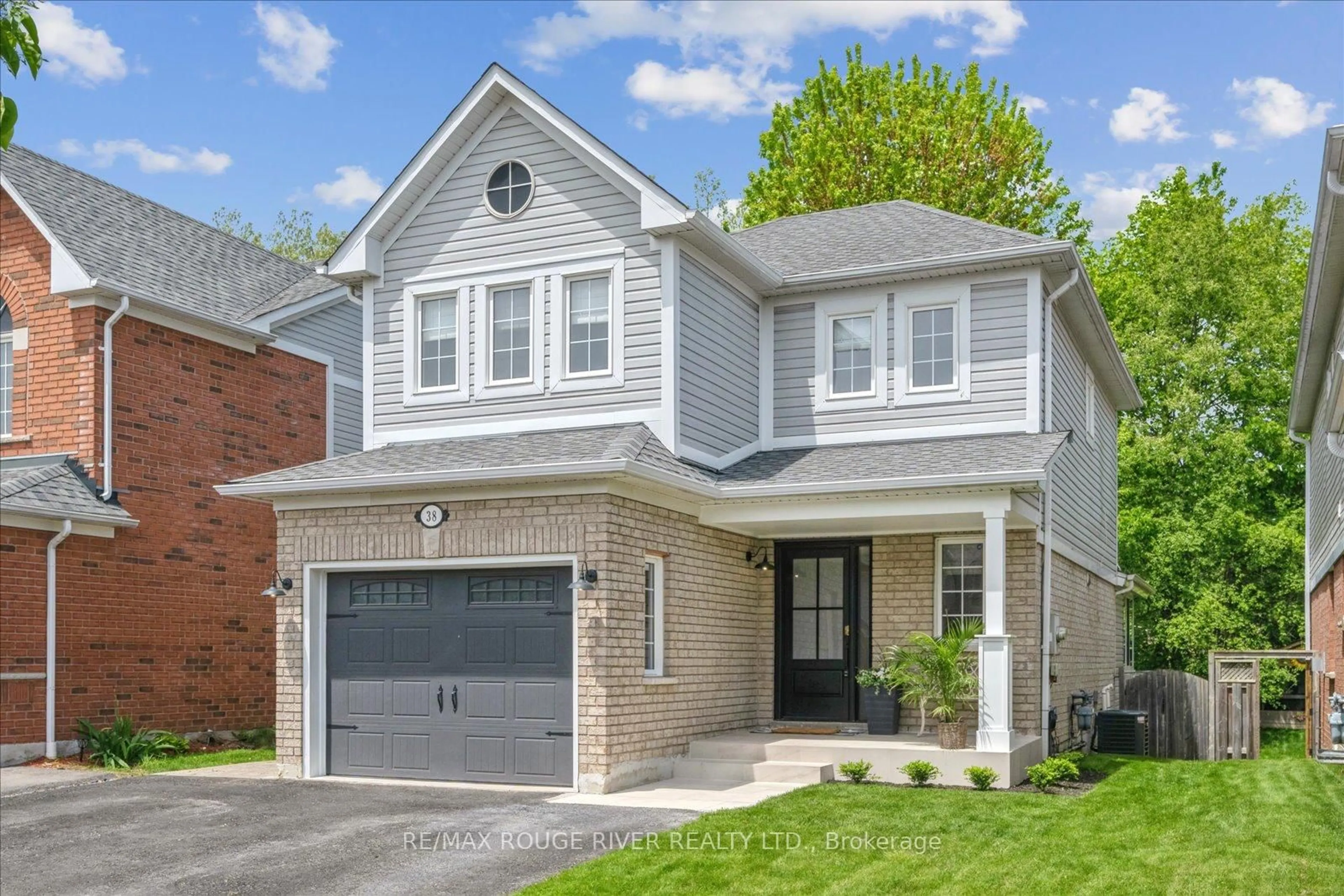 Home with brick exterior material, street for 38 Solmar Ave, Whitby Ontario L1R 2Z6