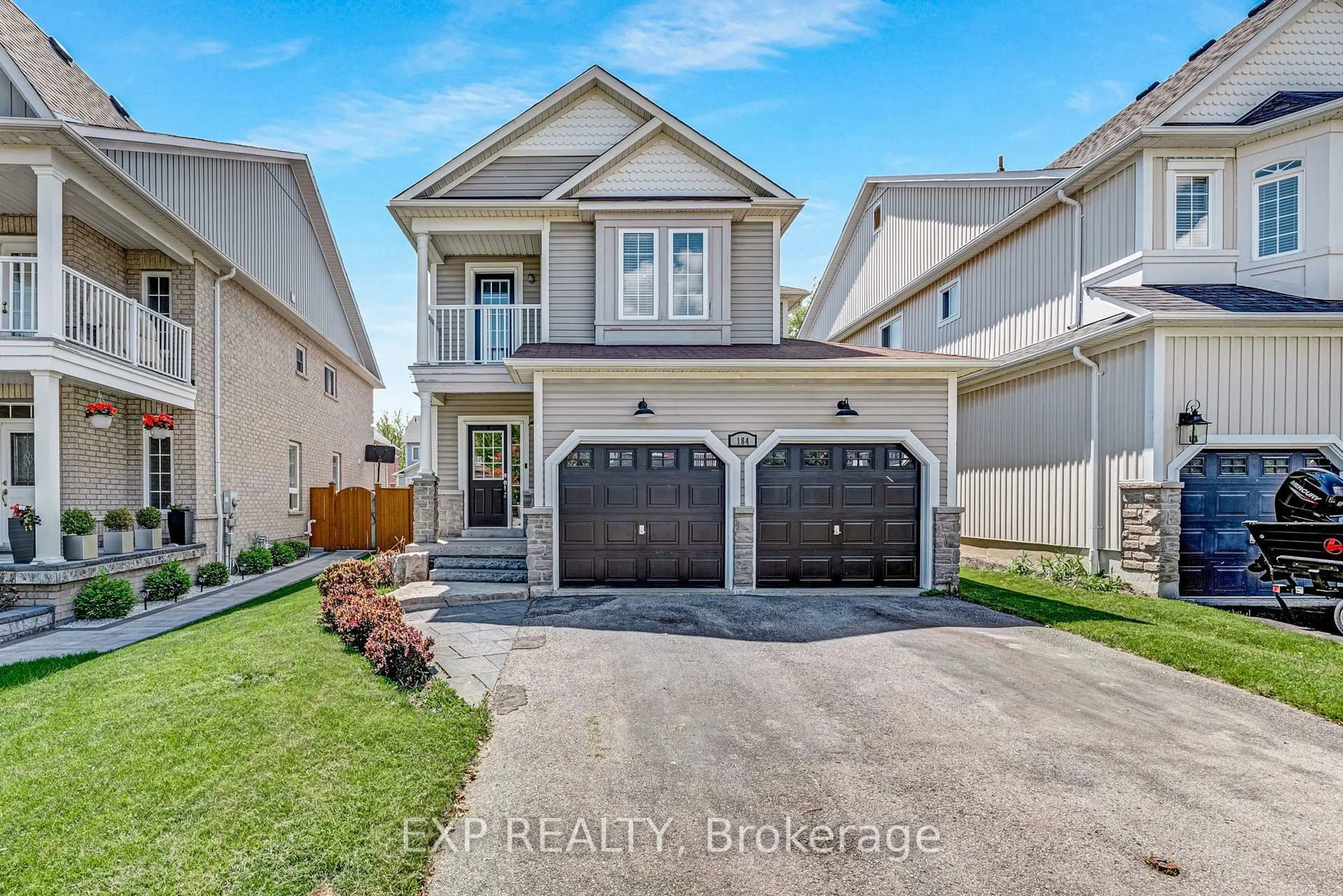 Home with vinyl exterior material, street for 184 Cachet Blvd, Whitby Ontario L1M 2L9