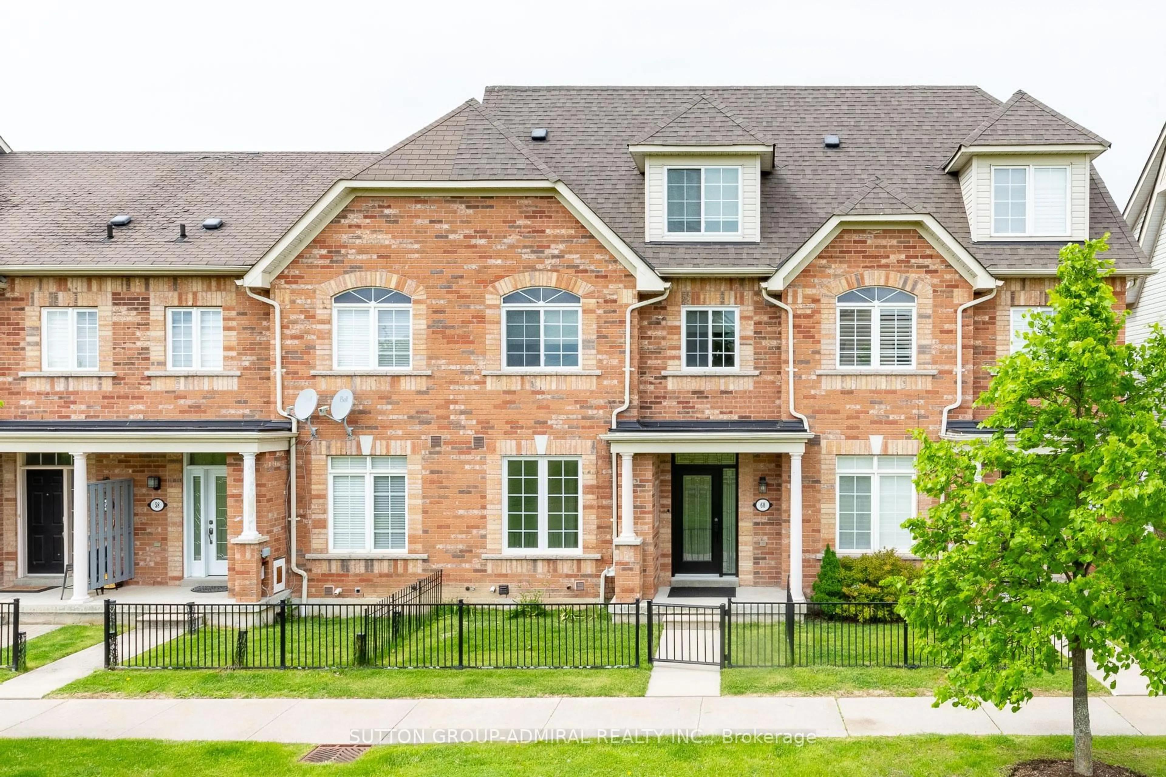 Home with brick exterior material, street for 60 Wicker Park Way, Whitby Ontario L1R 0C7