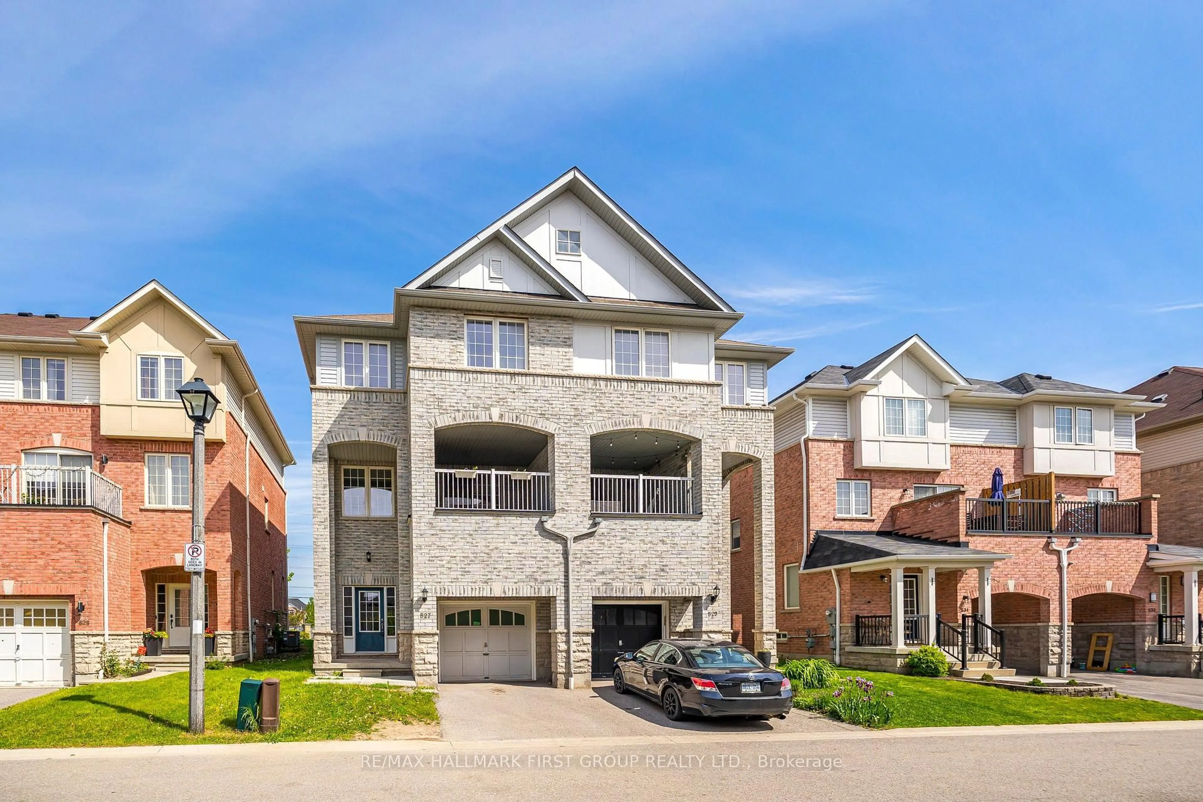 Home with brick exterior material, street for 527 Rossland Rd, Ajax Ontario L1T 4S1