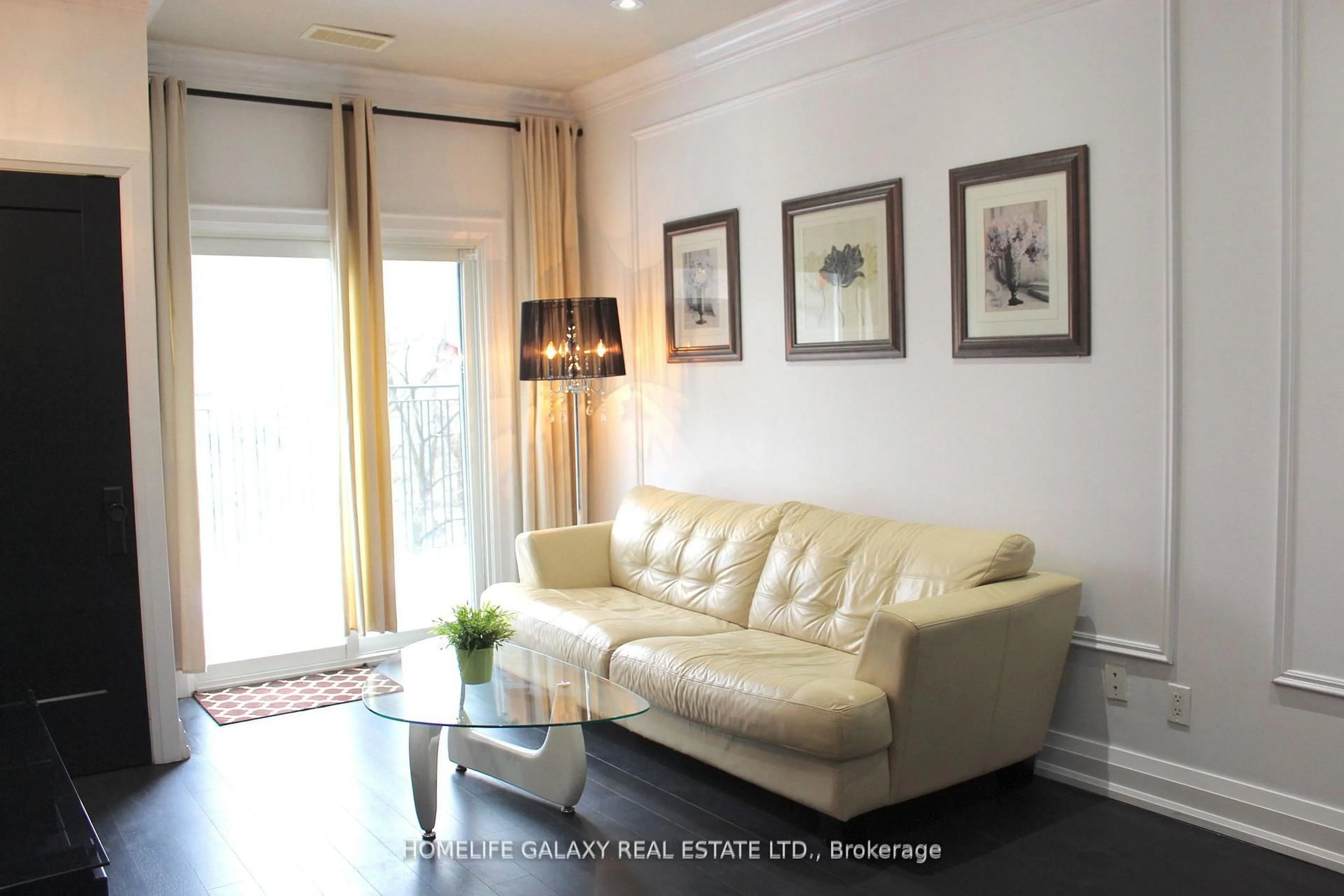 Living room with furniture, wood/laminate floor for 2351 Kennedy Rd #126, Toronto Ontario M1T 3G9