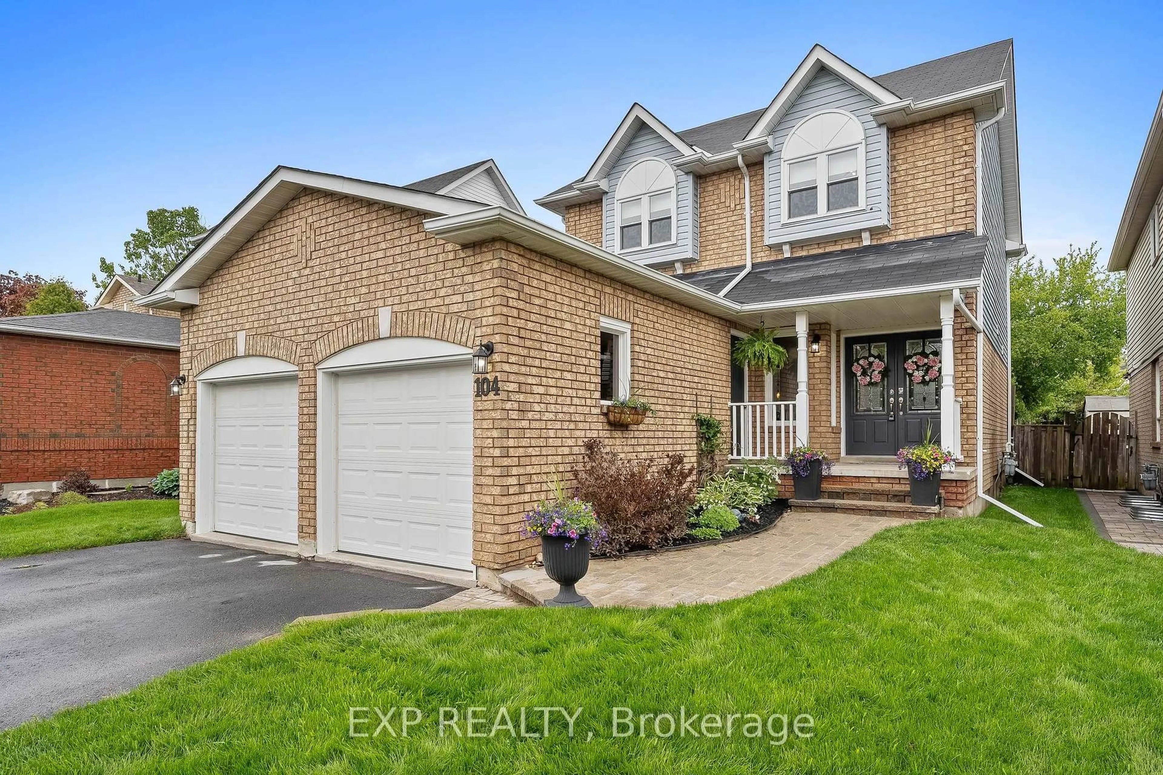 Home with brick exterior material, street for 104 Apple Blossom Blvd, Clarington Ontario L1C 4T7