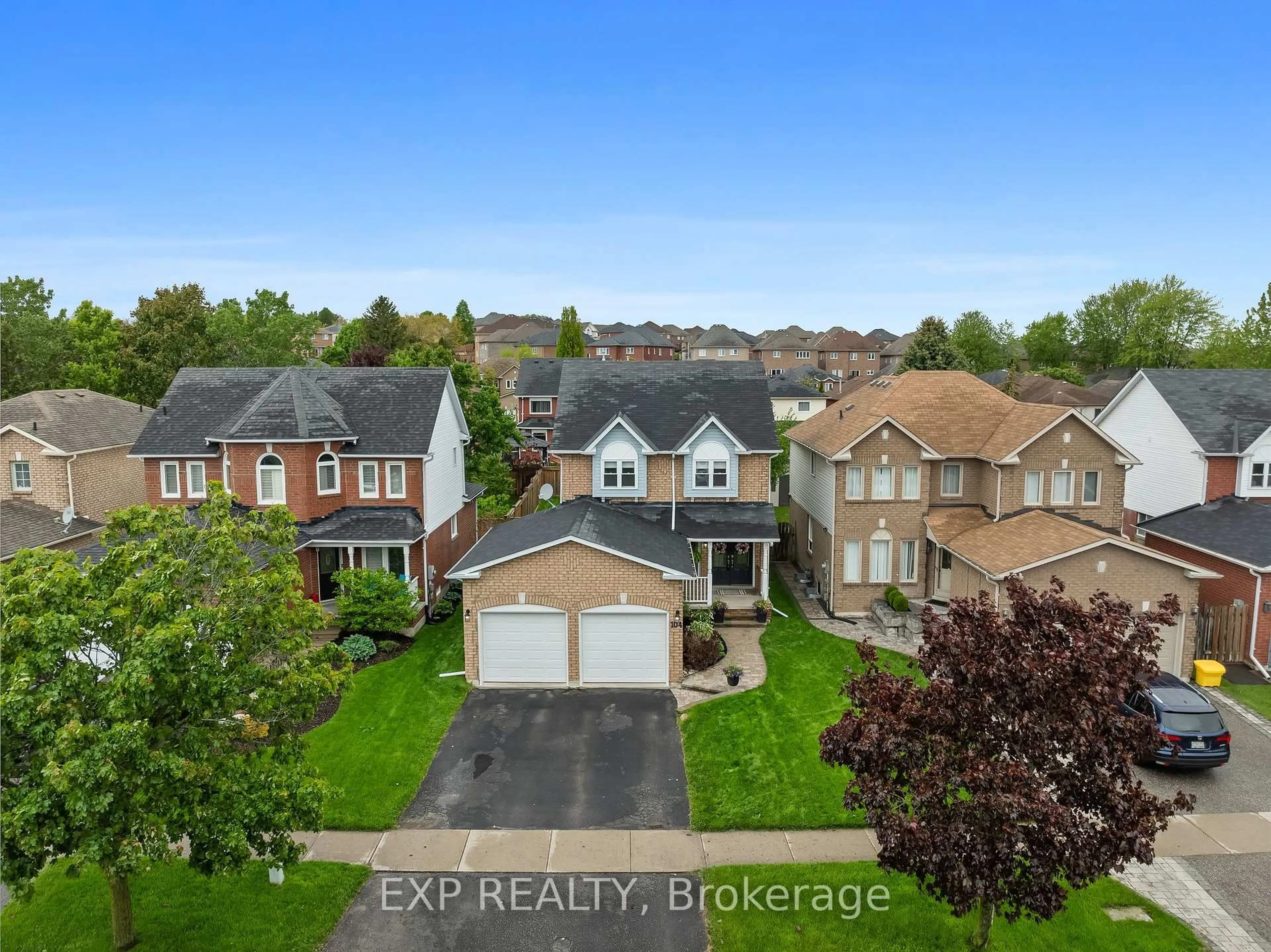 A pic from outside/outdoor area/front of a property/back of a property/a pic from drone, street for 104 Apple Blossom Blvd, Clarington Ontario L1C 4T7