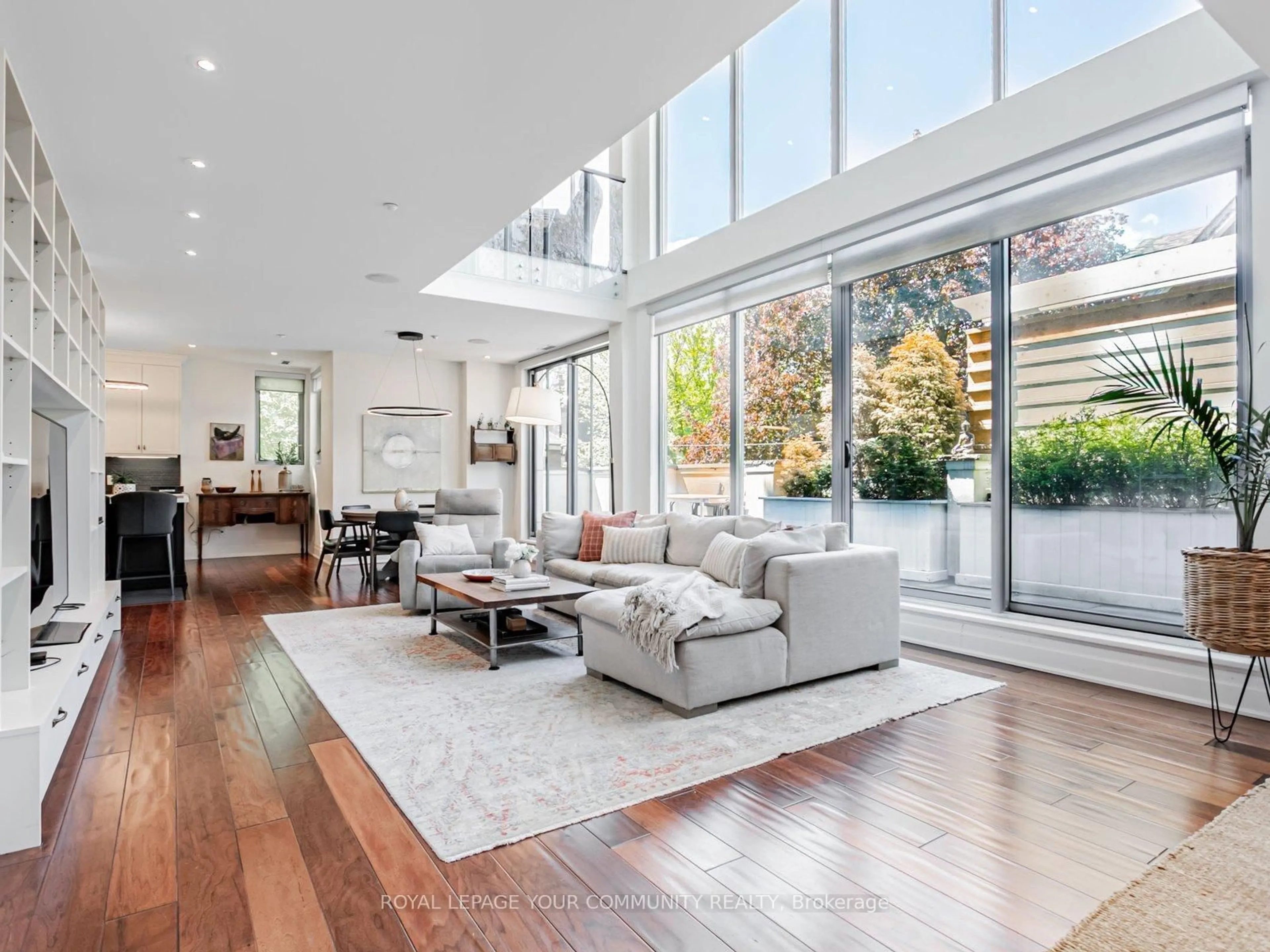 Living room with furniture, unknown for 1 Rainsford Rd #206, Toronto Ontario M4L 3N5