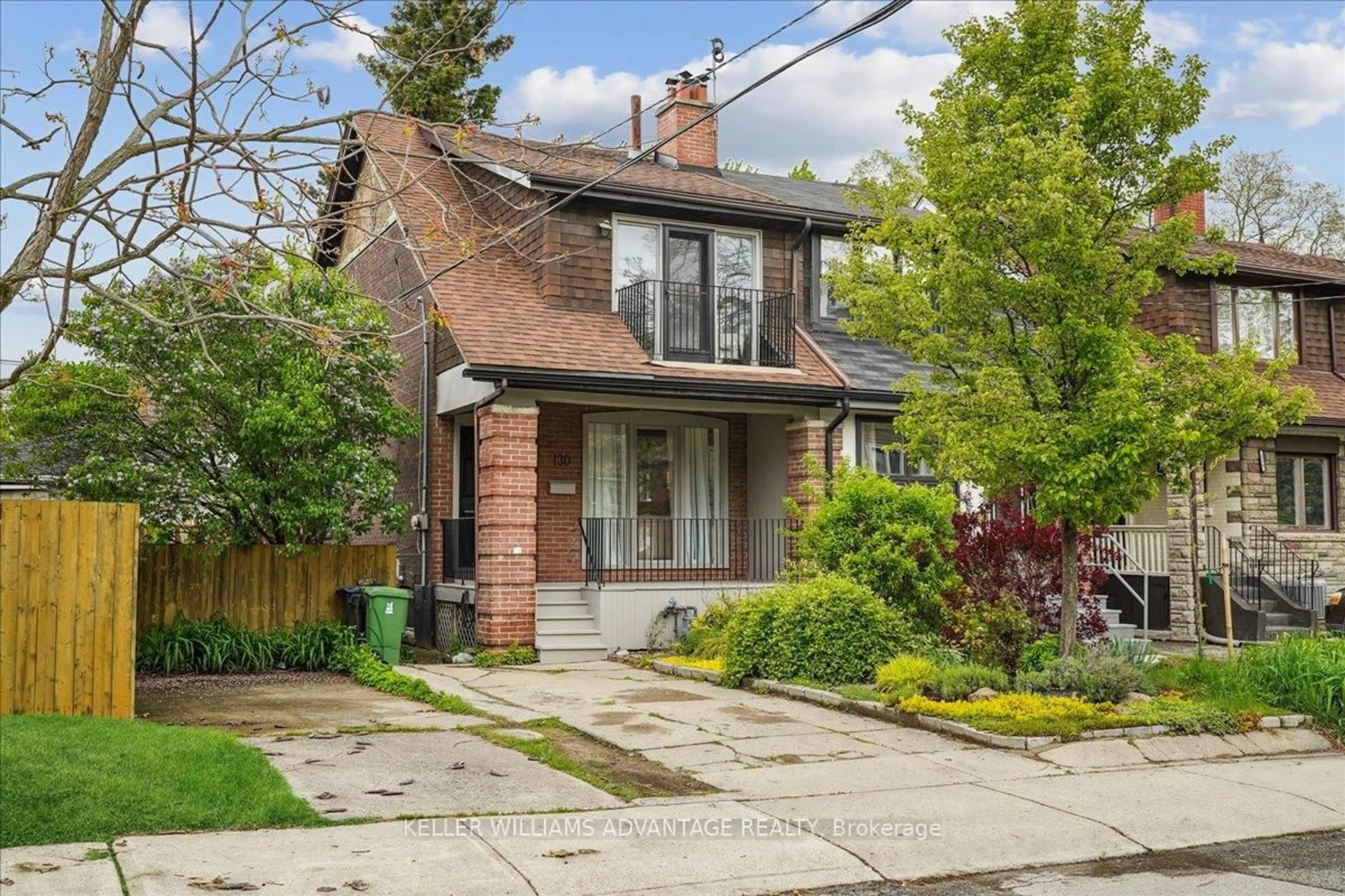 Home with brick exterior material, street for 130 Glebeholme Blvd, Toronto Ontario M4J 1S6