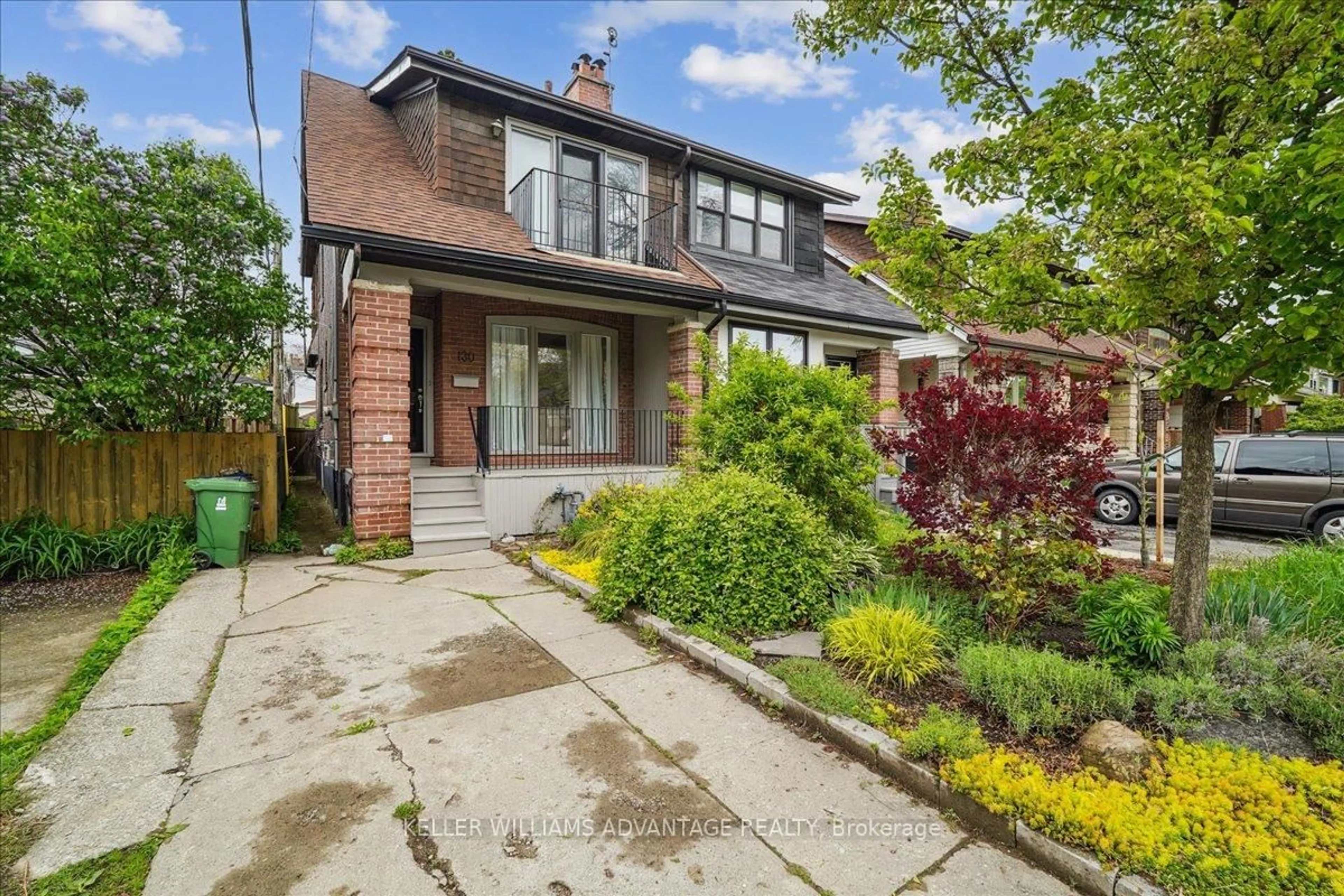 Home with brick exterior material, street for 130 Glebeholme Blvd, Toronto Ontario M4J 1S6