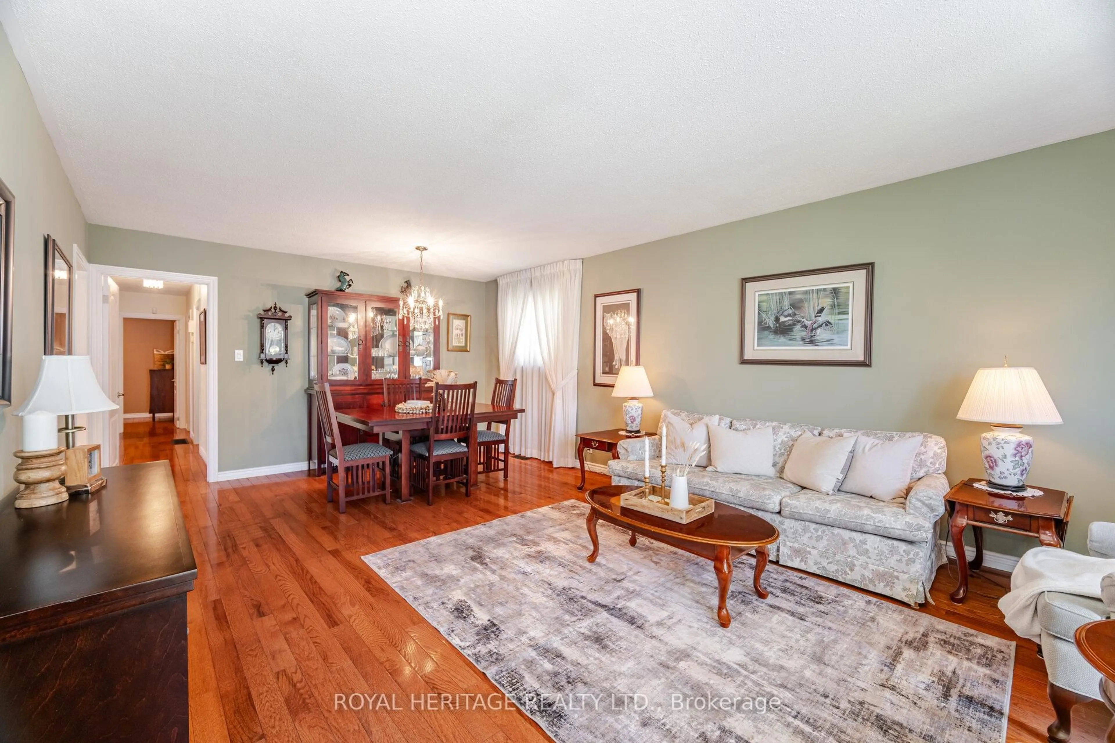 Living room with furniture, wood/laminate floor for 808 Batory Ave, Pickering Ontario L1W 2W3