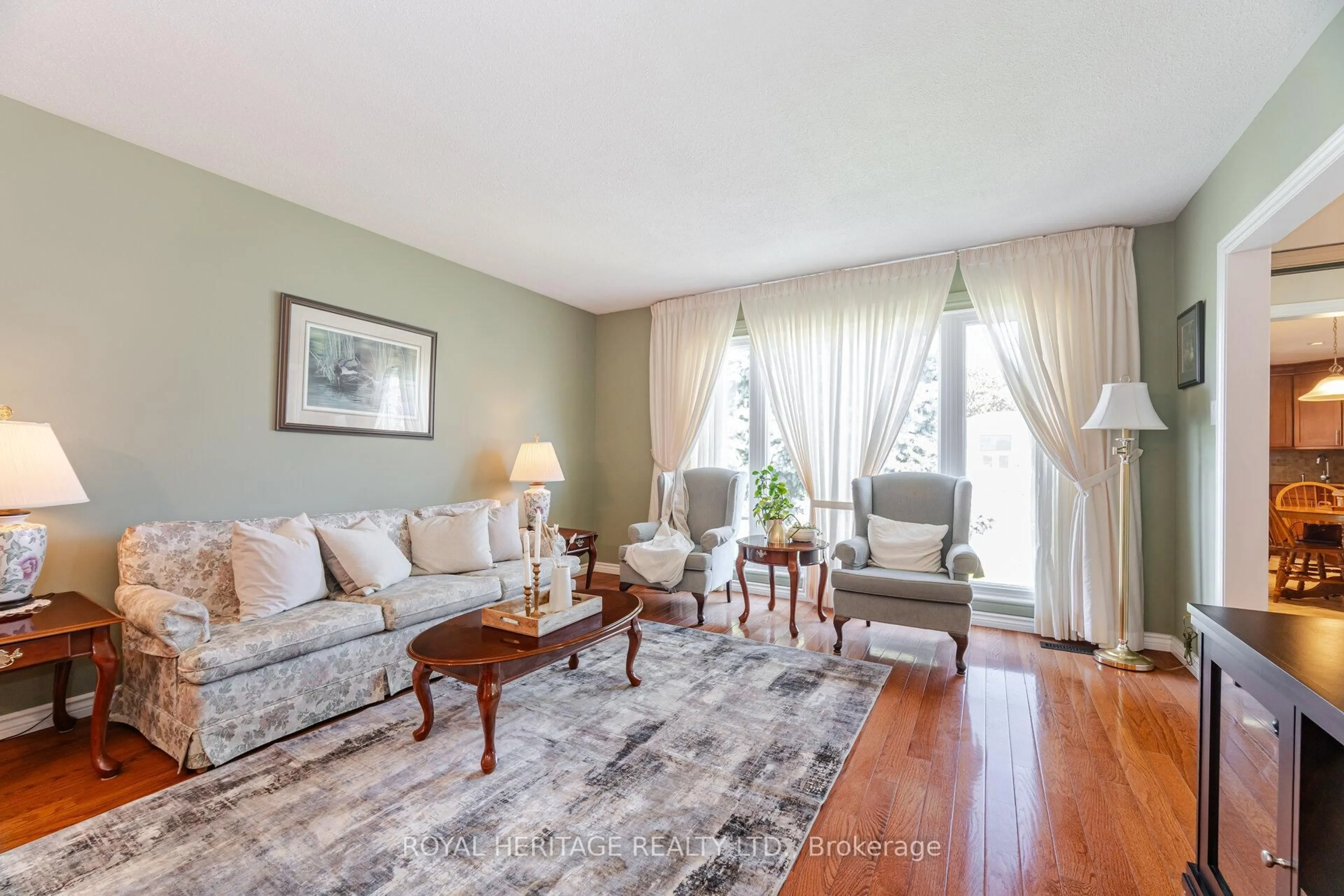 Living room with furniture, wood/laminate floor for 808 Batory Ave, Pickering Ontario L1W 2W3