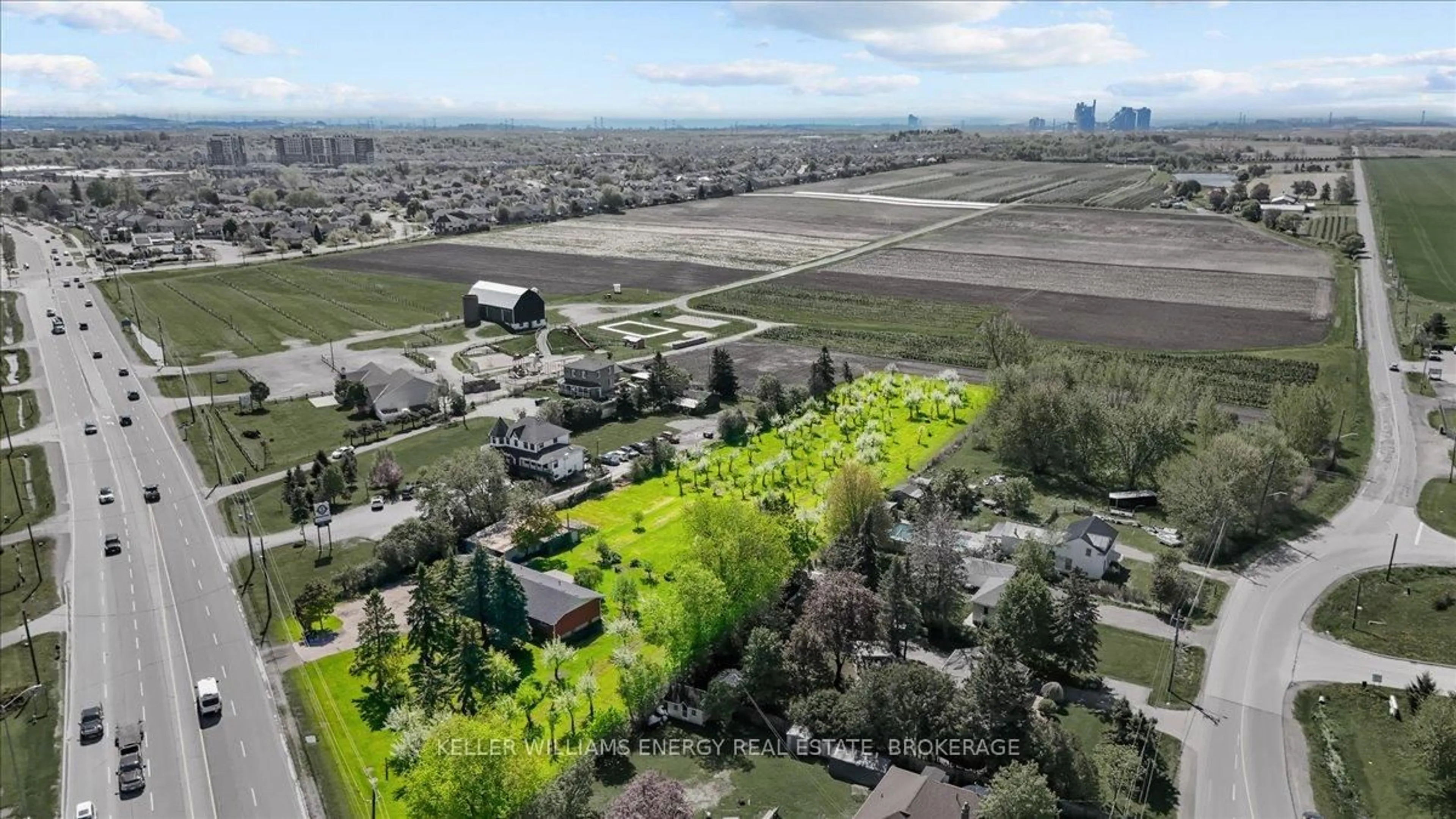 A pic from outside/outdoor area/front of a property/back of a property/a pic from drone, street for 2263 Hwy 2 Highway, Clarington Ontario L1C 3K7