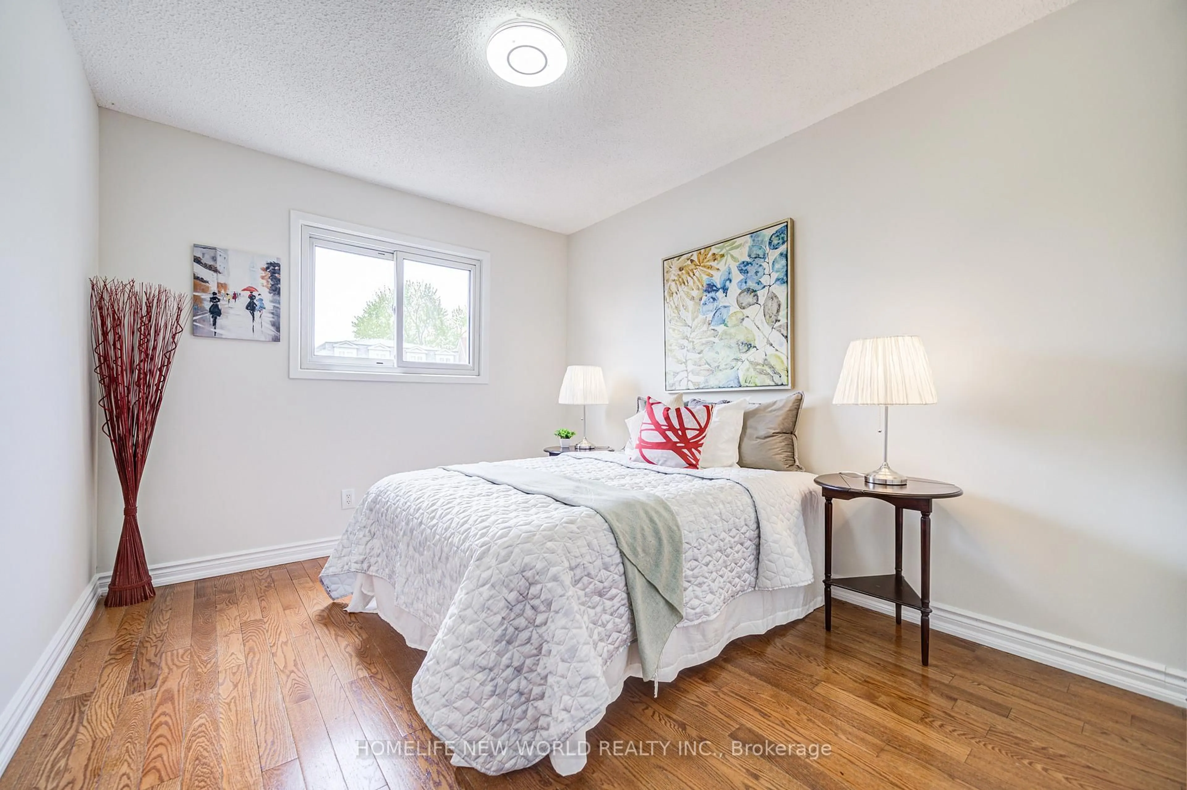 Bedroom with bed, wood/laminate floor for 27 Massie St, Toronto Ontario M1S 3Z7