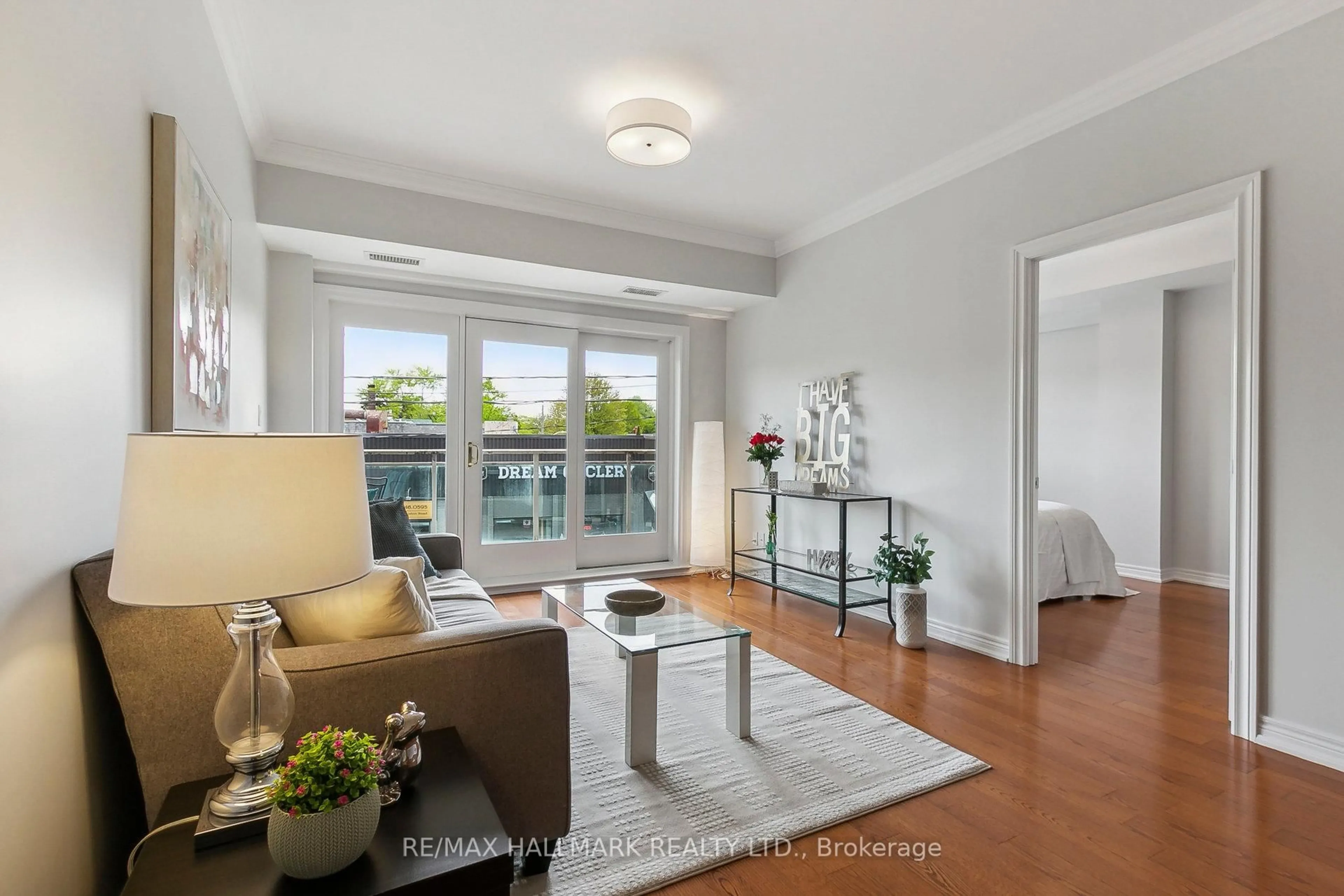 Living room with furniture, unknown for 1 Lawlor Ave #206, Toronto Ontario M4E 3L8
