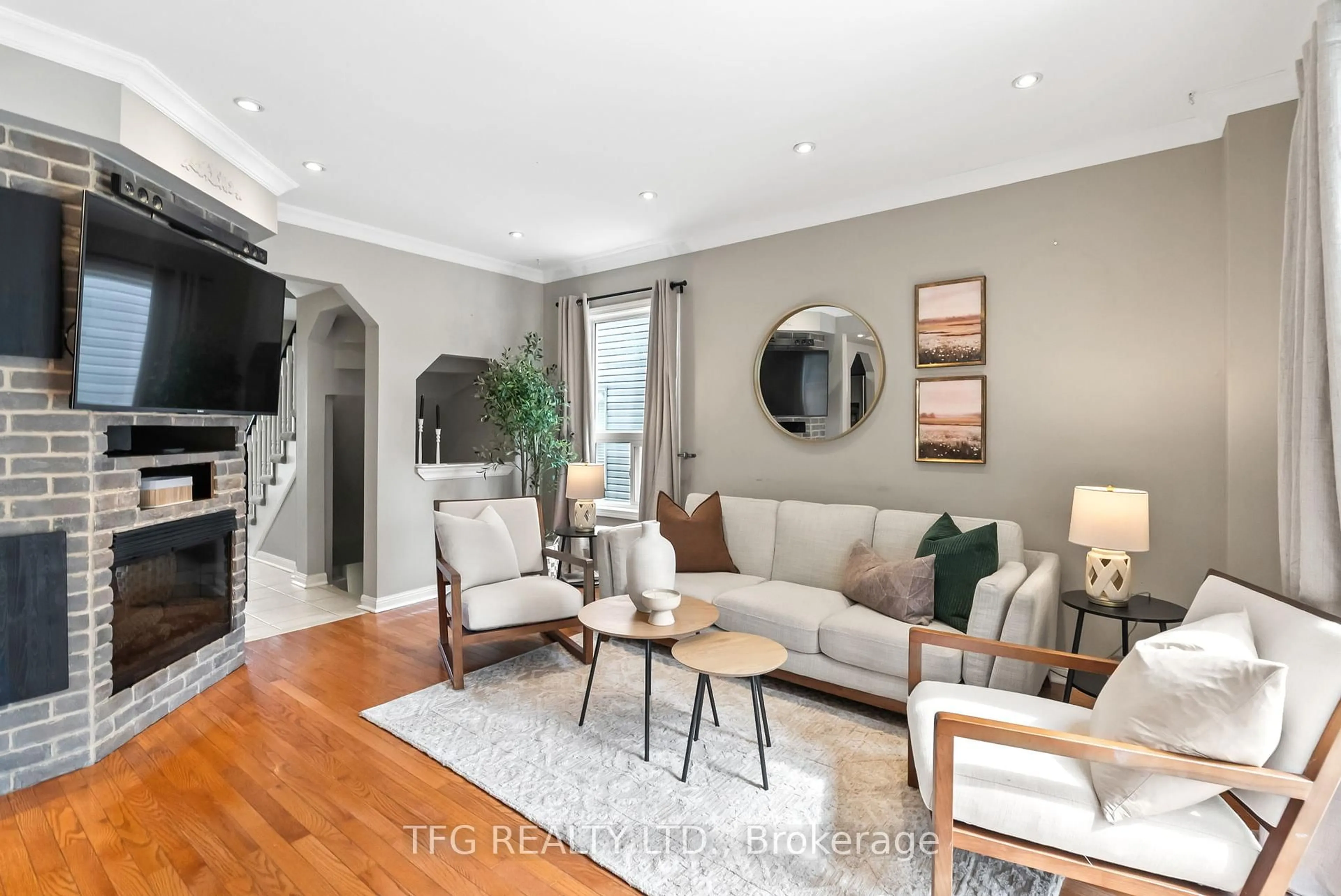 Living room with furniture, wood/laminate floor for 1632 Green Rd, Clarington Ontario L1C 5K7