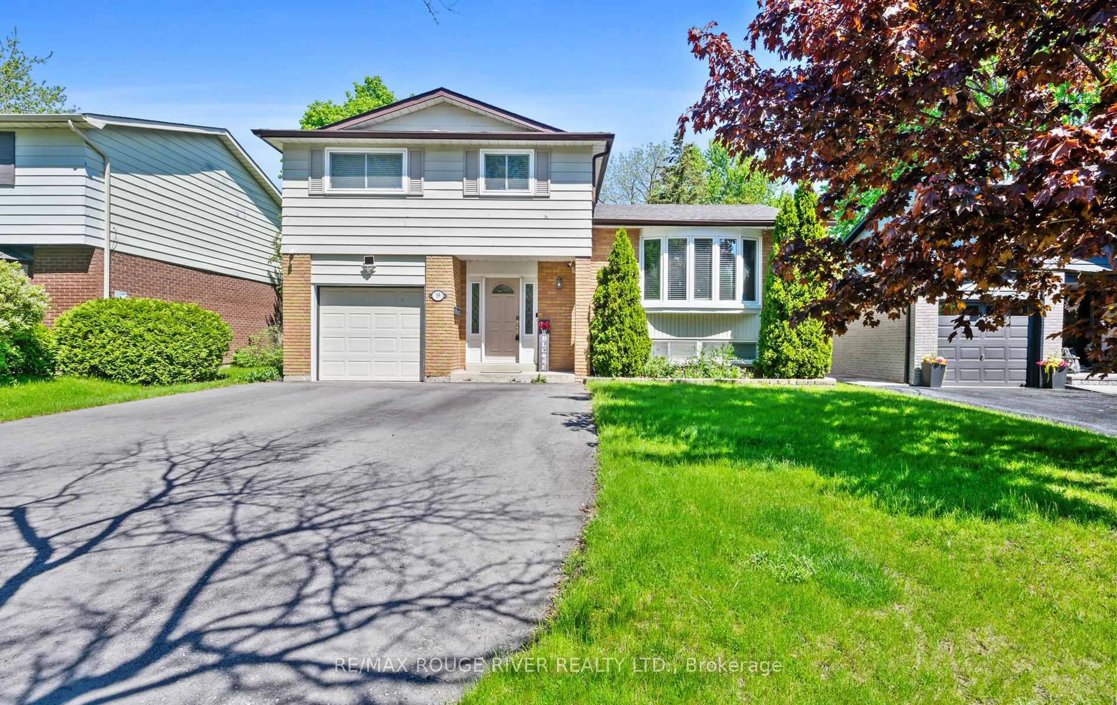 Home with vinyl exterior material, street for 59 Calais St, Whitby Ontario L1N 5M3