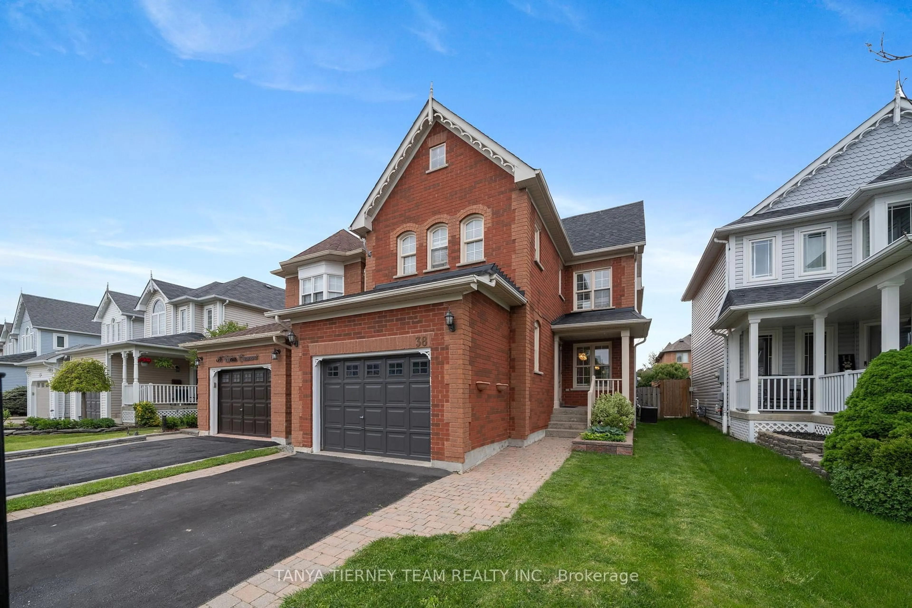 Home with brick exterior material, street for 38 Wells Cres, Whitby Ontario L1M 1C9