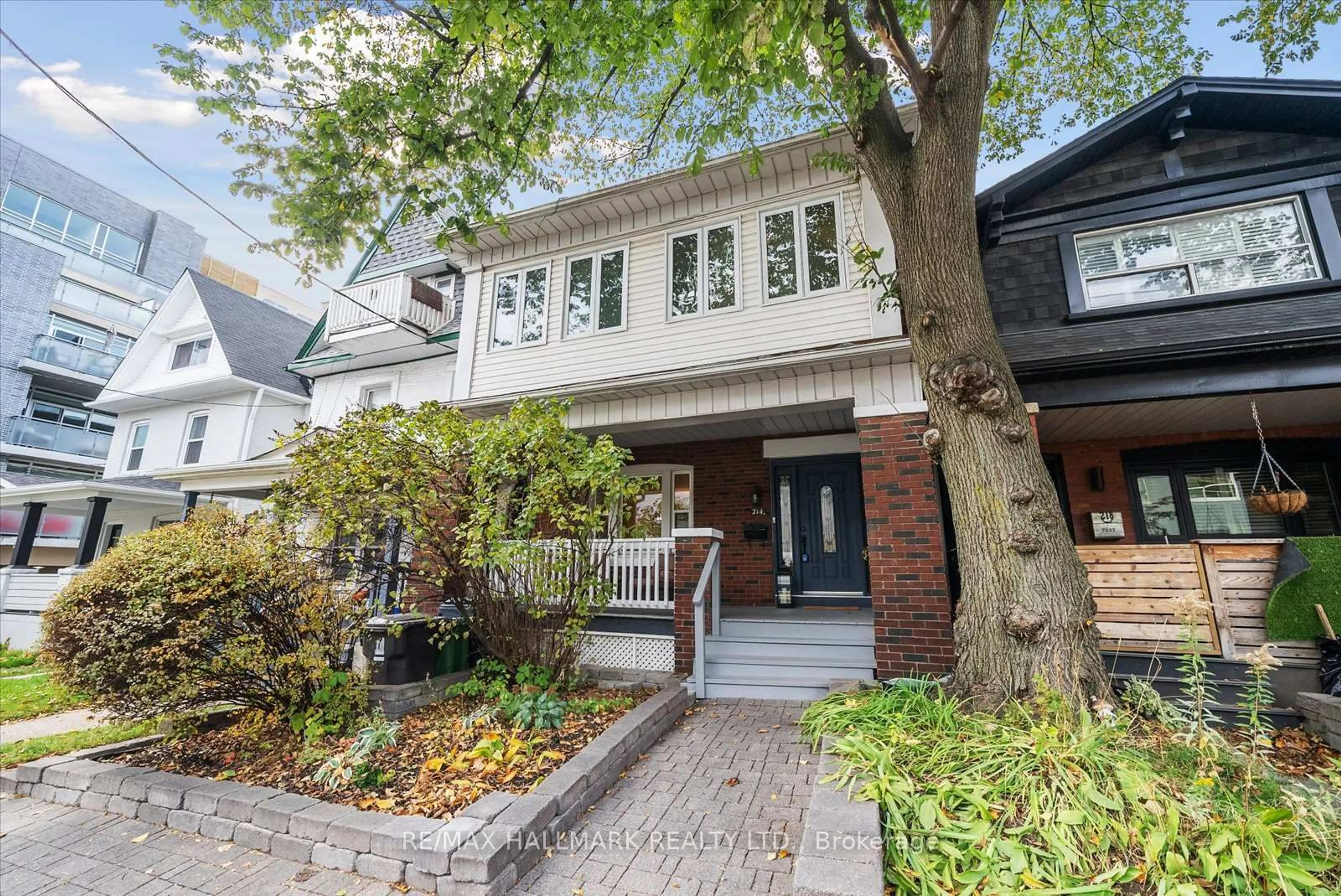 Home with brick exterior material, street for 214 Woodbine Ave, Toronto Ontario M4L 3P2