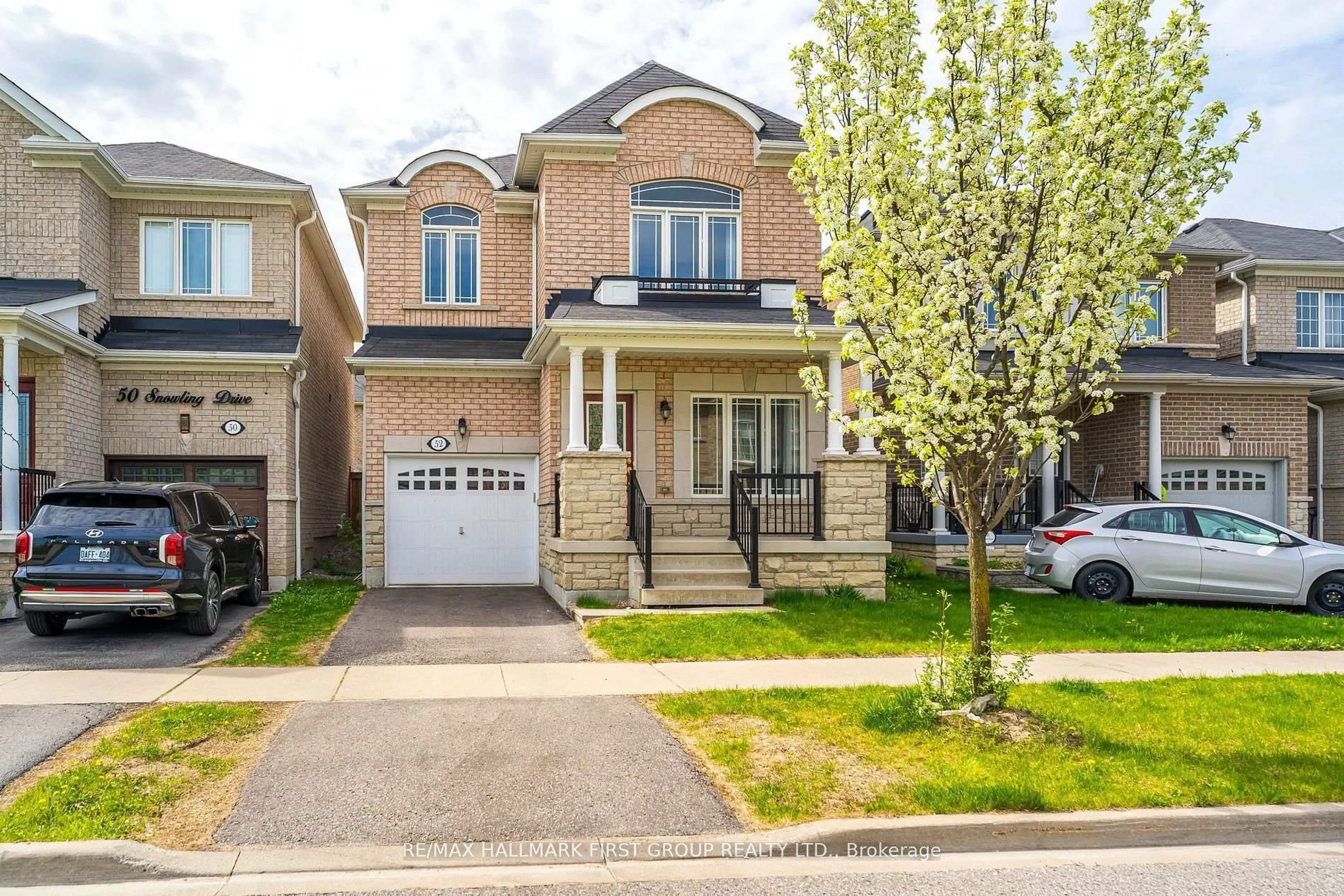 Home with brick exterior material, street for 52 Snowling Dr, Ajax Ontario L1Z 0M4