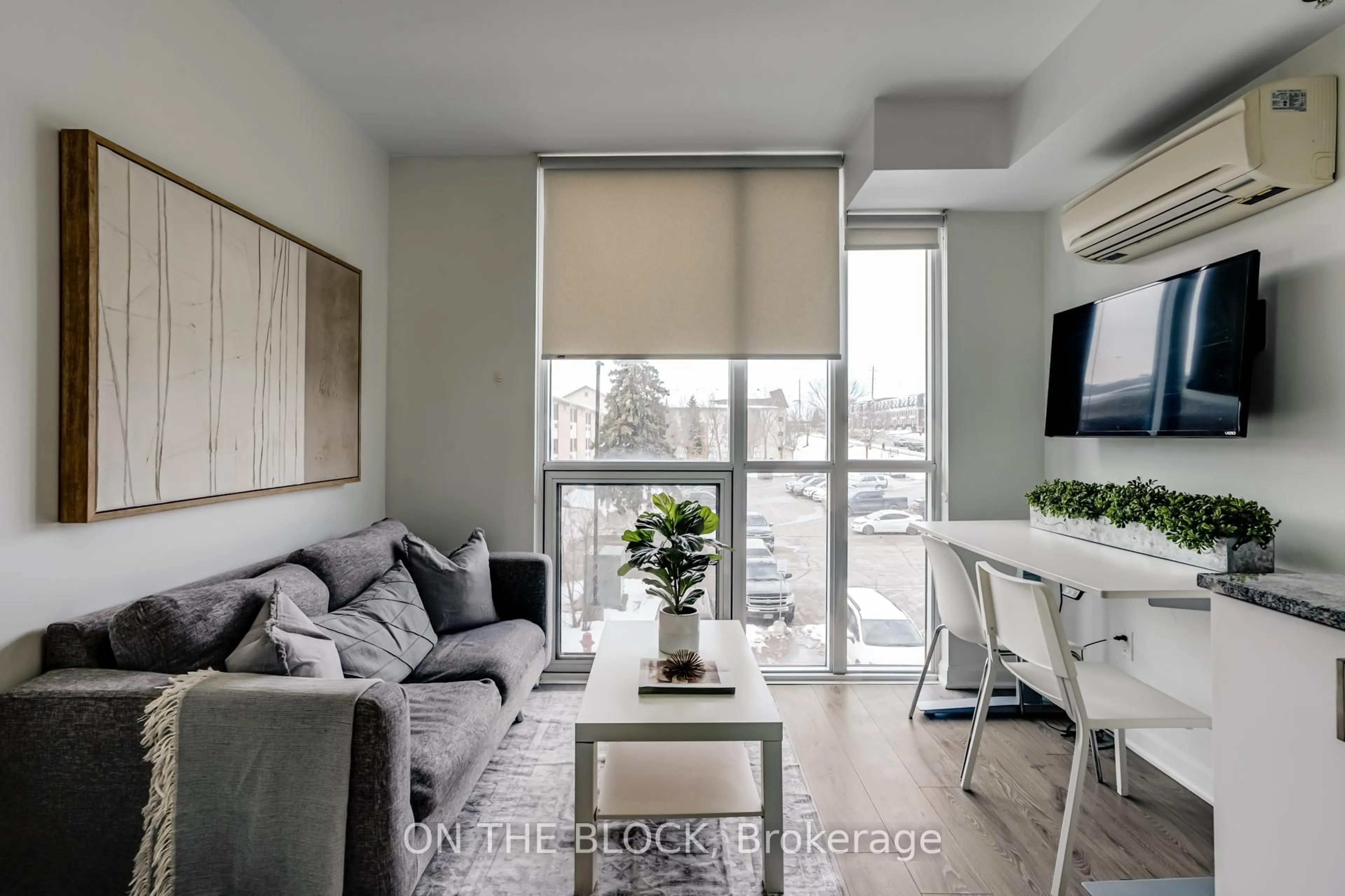 Living room with furniture, unknown for 1900 Simcoe St #223, Oshawa Ontario L1G 4Y3