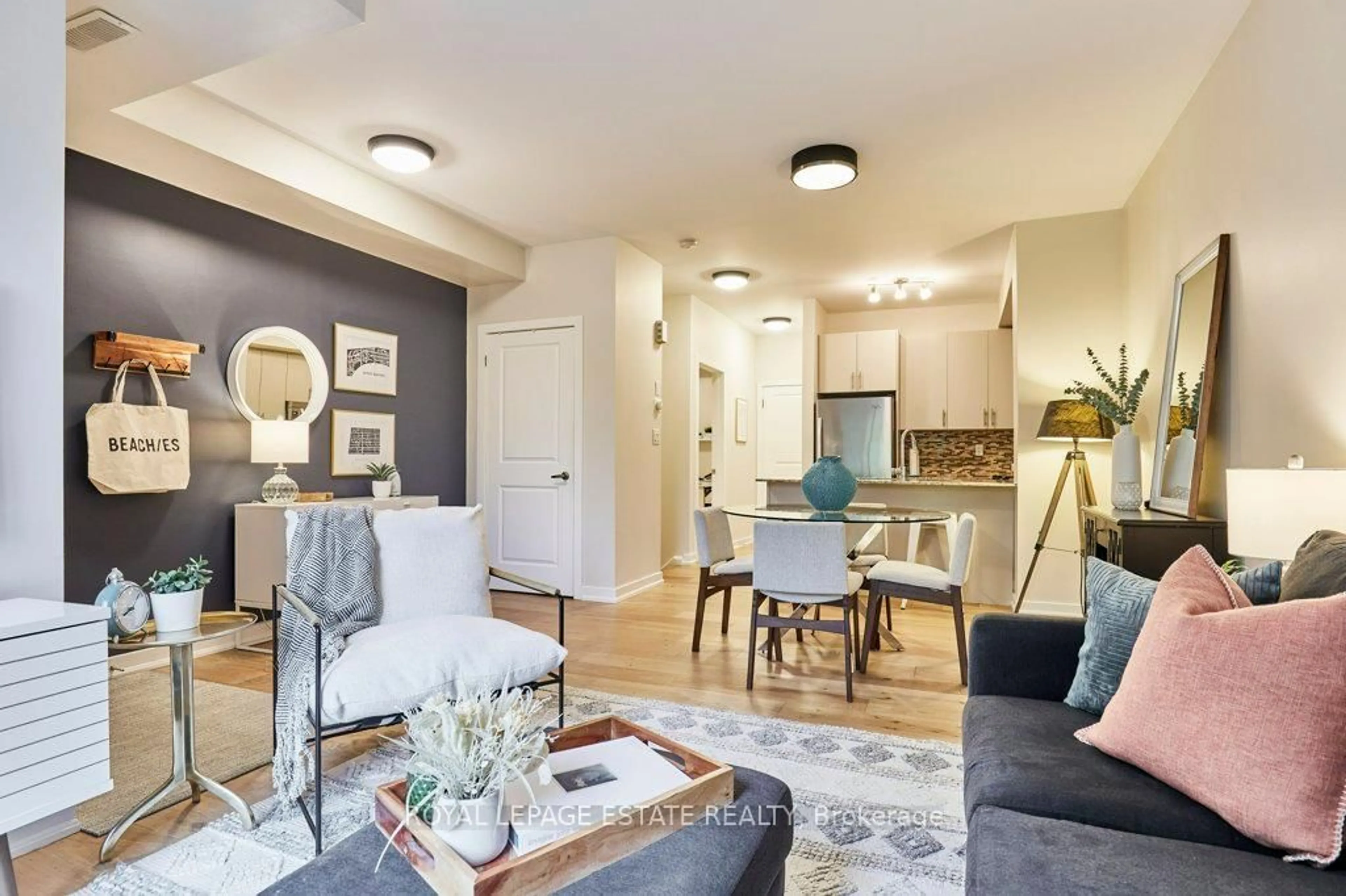 Living room with furniture, unknown for 2320 Gerrard St #128, Toronto Ontario M4E 2E1