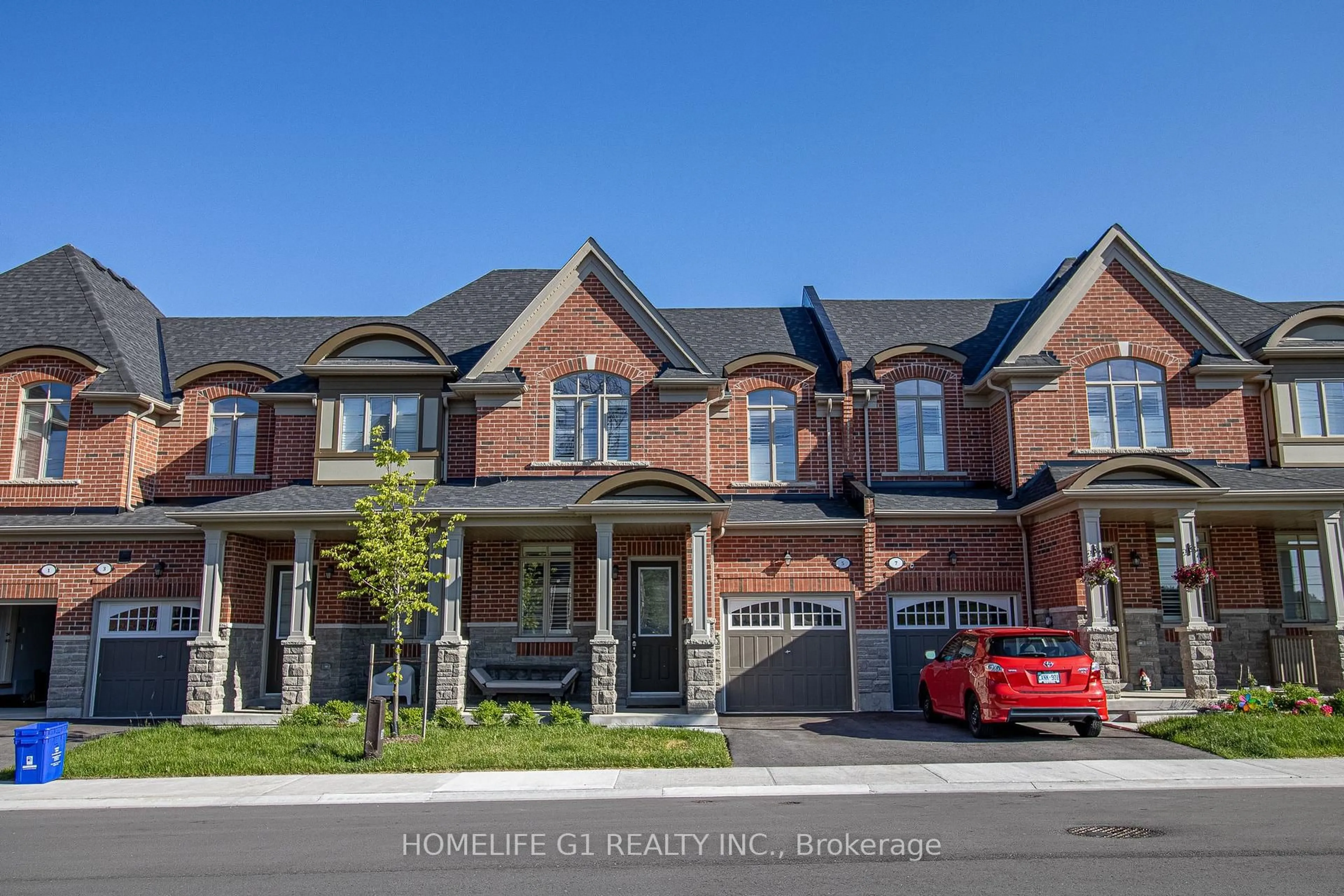 Home with brick exterior material, street for 5 Caton Lane, Ajax Ontario L1T 0P8