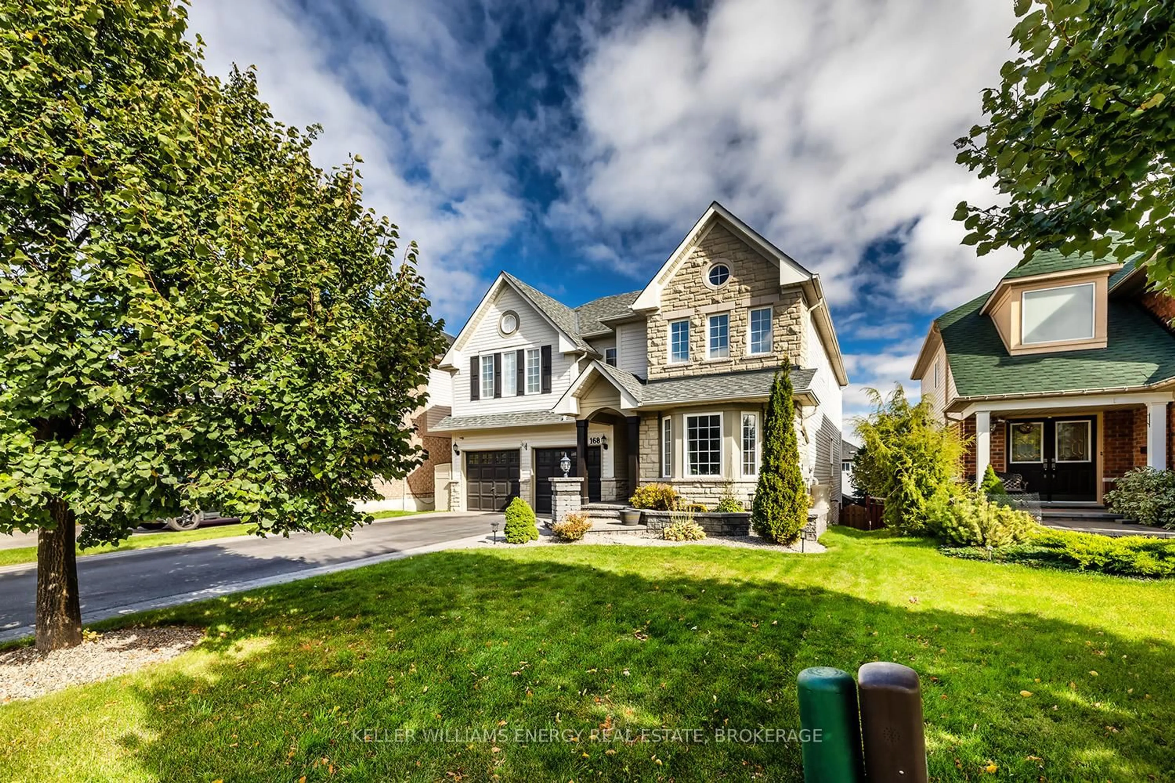 Home with brick exterior material, street for 168 Millburn Dr, Clarington Ontario L1C 5M1