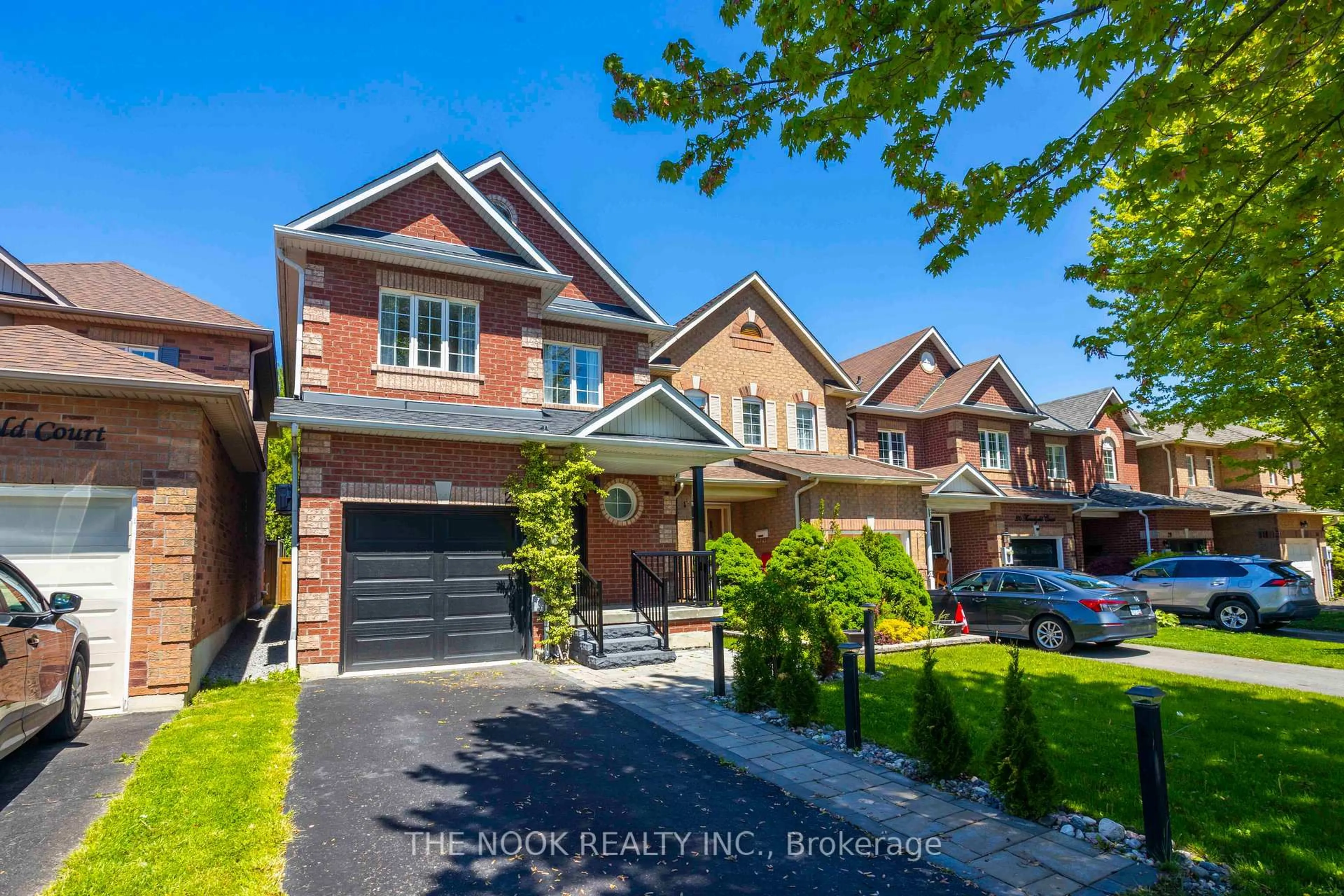 Home with brick exterior material, street for 22 Threadgold Crt, Whitby Ontario L1P 1L9