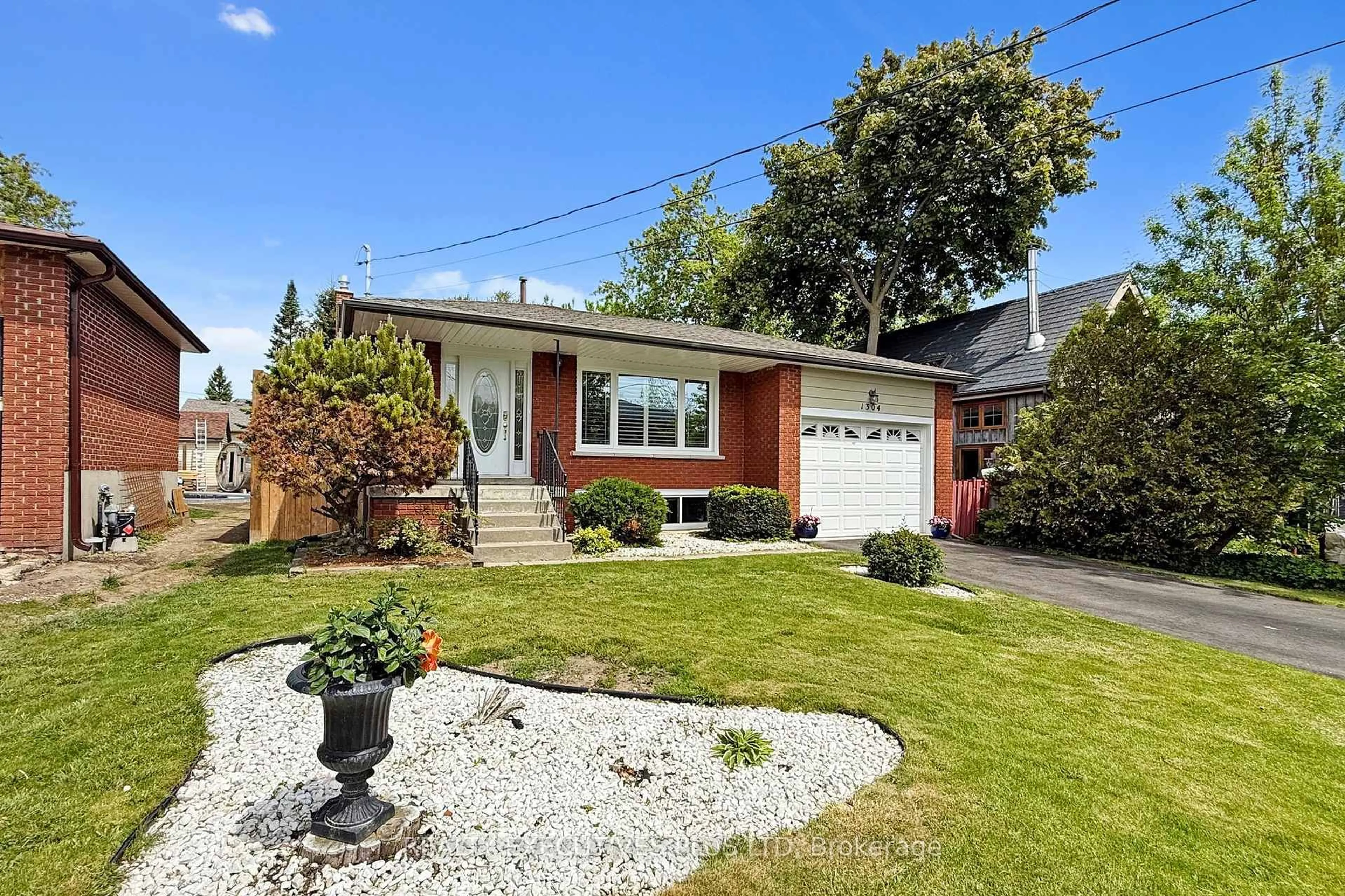 Home with brick exterior material, street for 1304 Wharf St, Pickering Ontario L1W 1A4