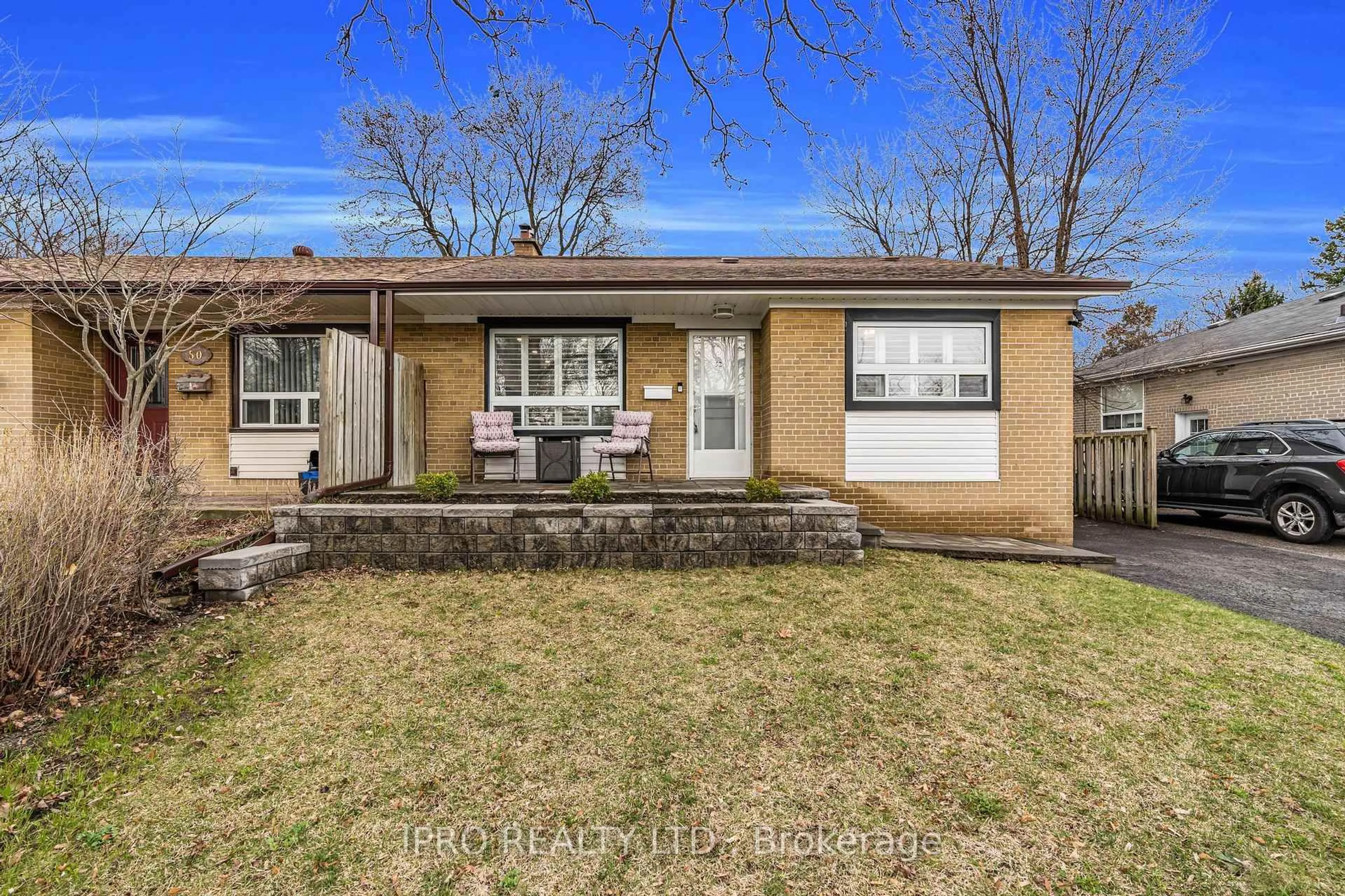 Home with brick exterior material, street for 52 Tulloch Dr, Ajax Ontario L1S 2S5