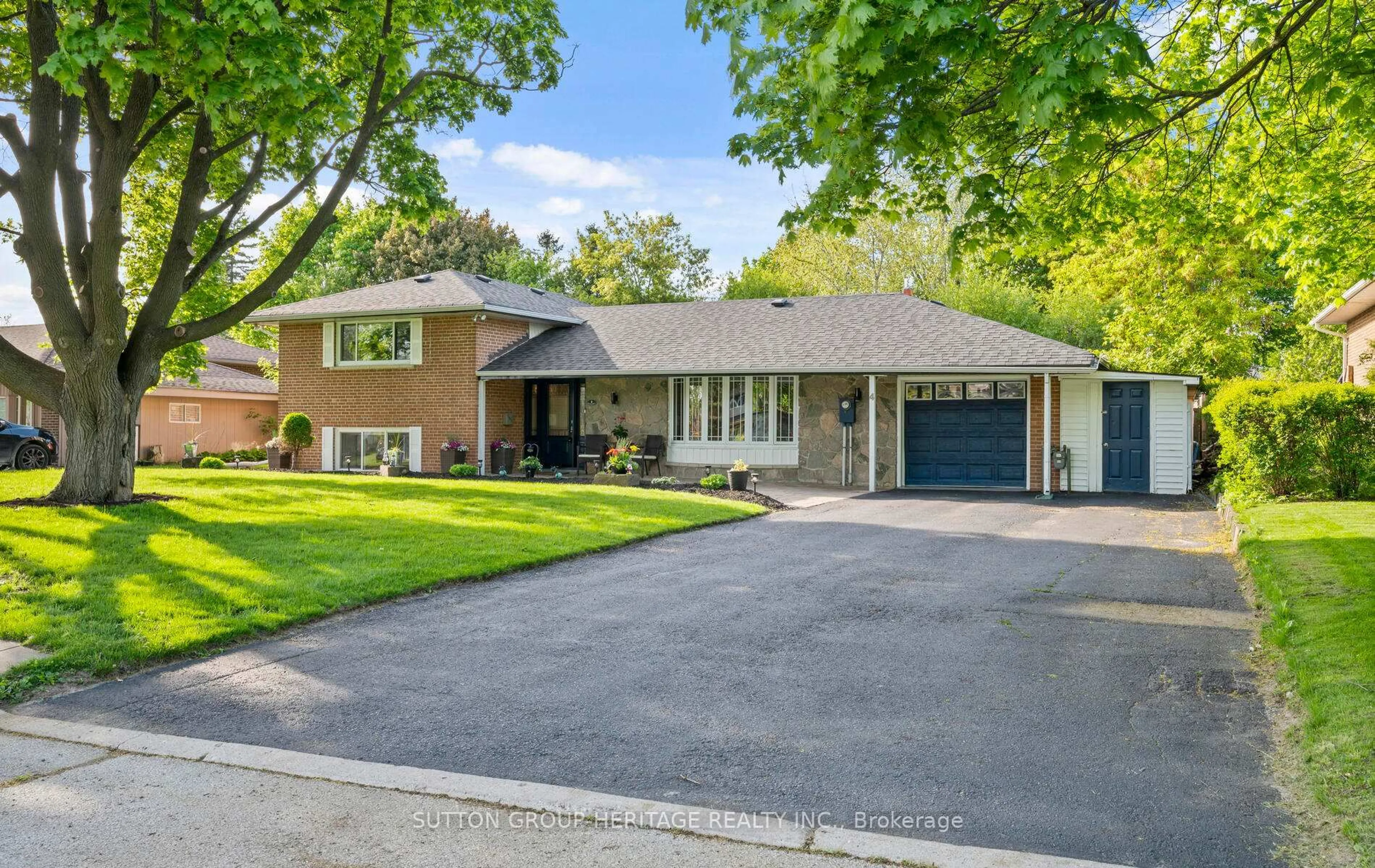 Home with brick exterior material, street for 4 Clarelyn Blvd, Ajax Ontario L1S 6G9