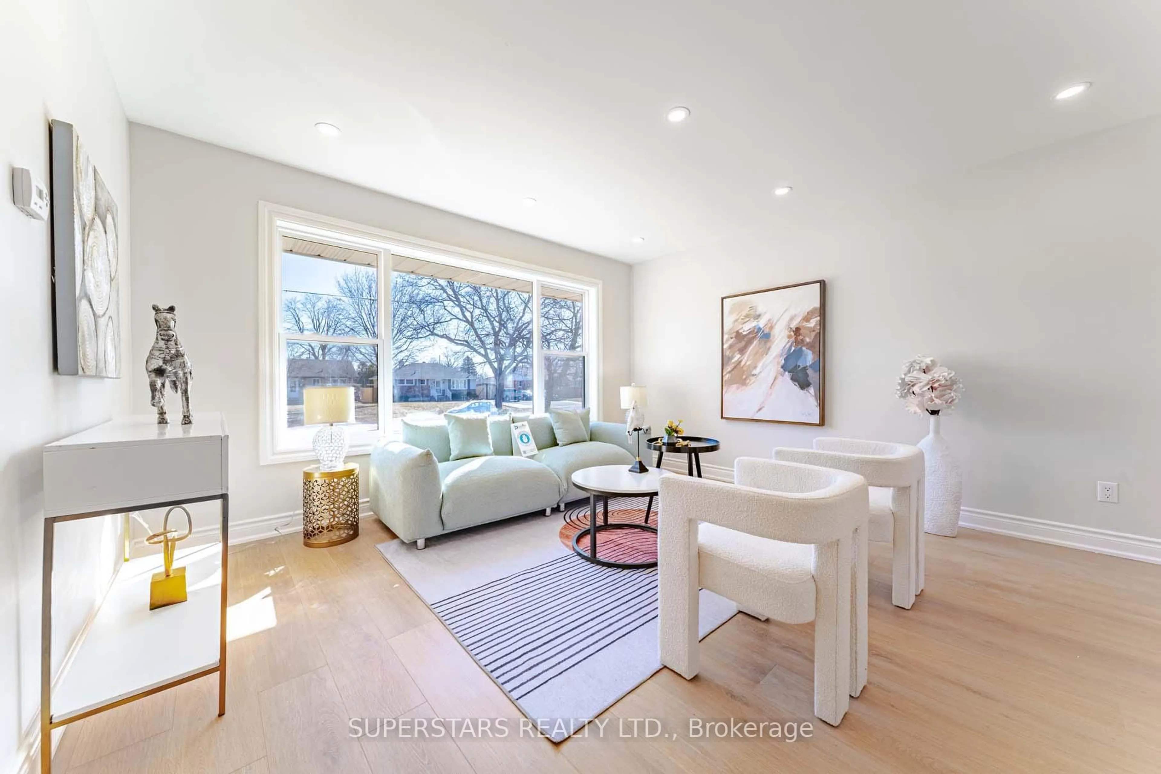 Living room with furniture, wood/laminate floor for 474 Fernhill Blvd, Oshawa Ontario L1J 5J7