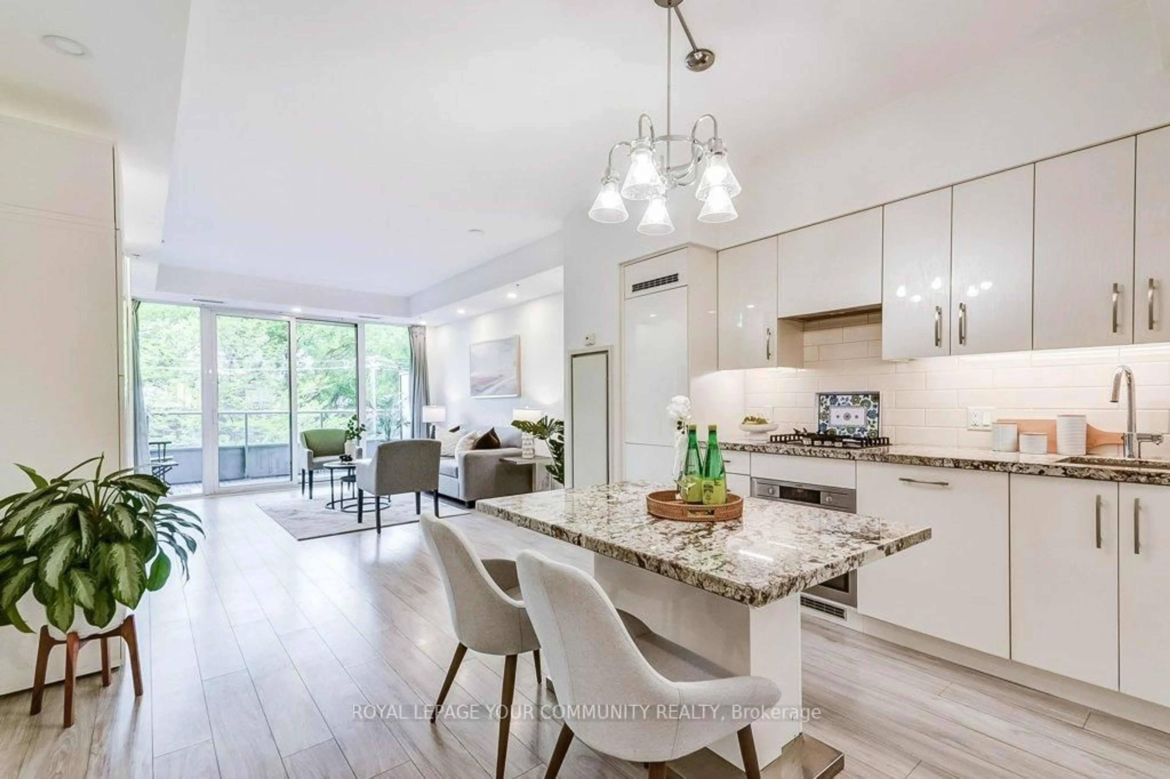 Open concept kitchen, wood/laminate floor for 1960 Queen St #306, Toronto Ontario M4L 1H8