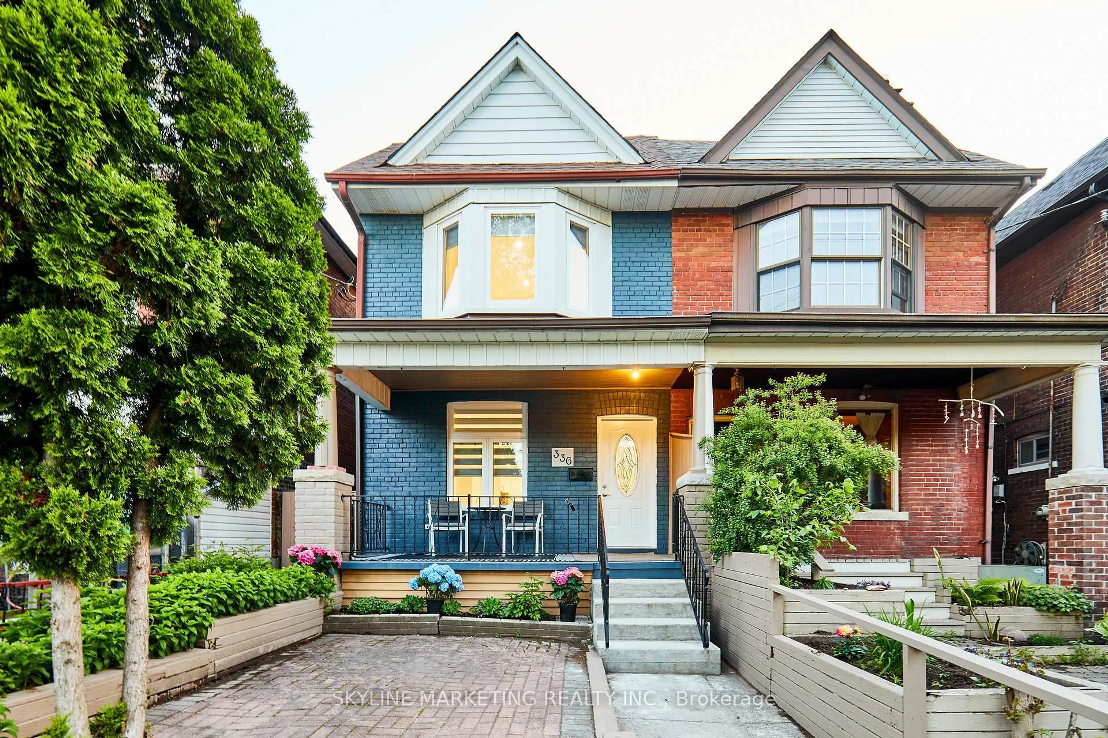 Home with brick exterior material, street for 336 Leslie St, Toronto Ontario M4M 3E1