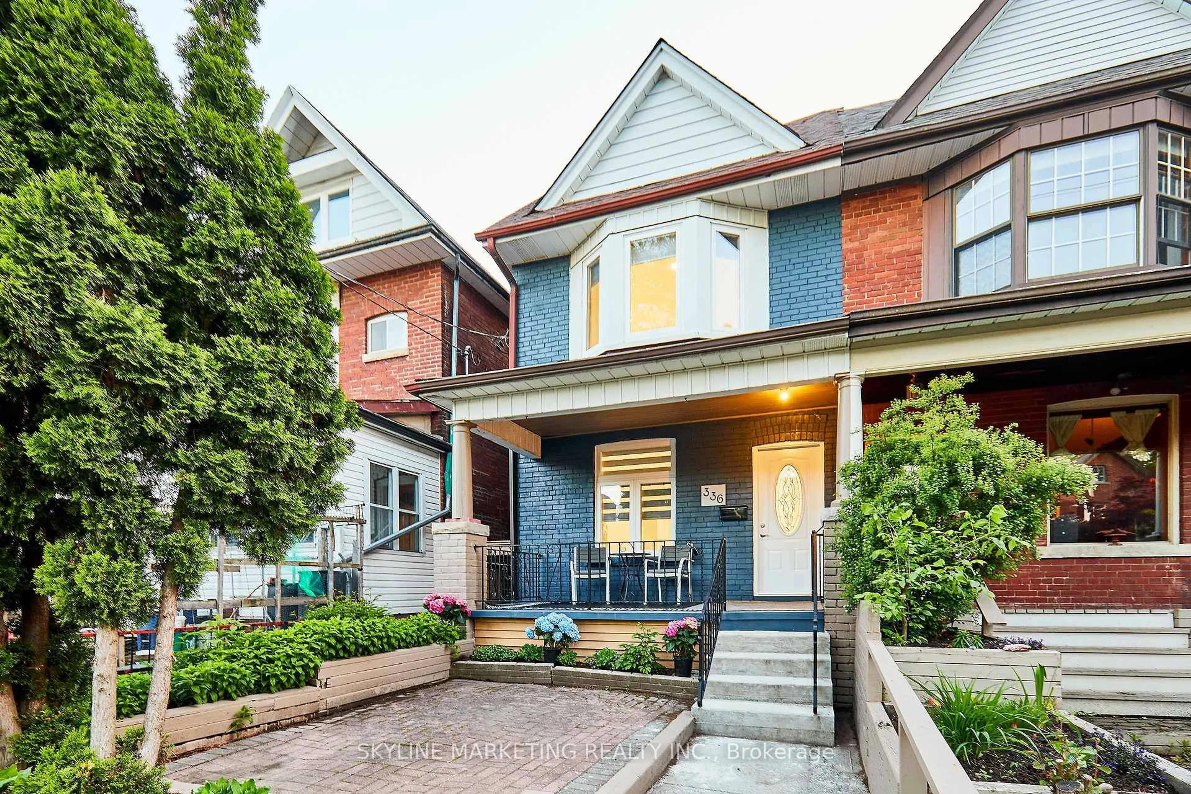 Home with brick exterior material, street for 336 Leslie St, Toronto Ontario M4M 3E1