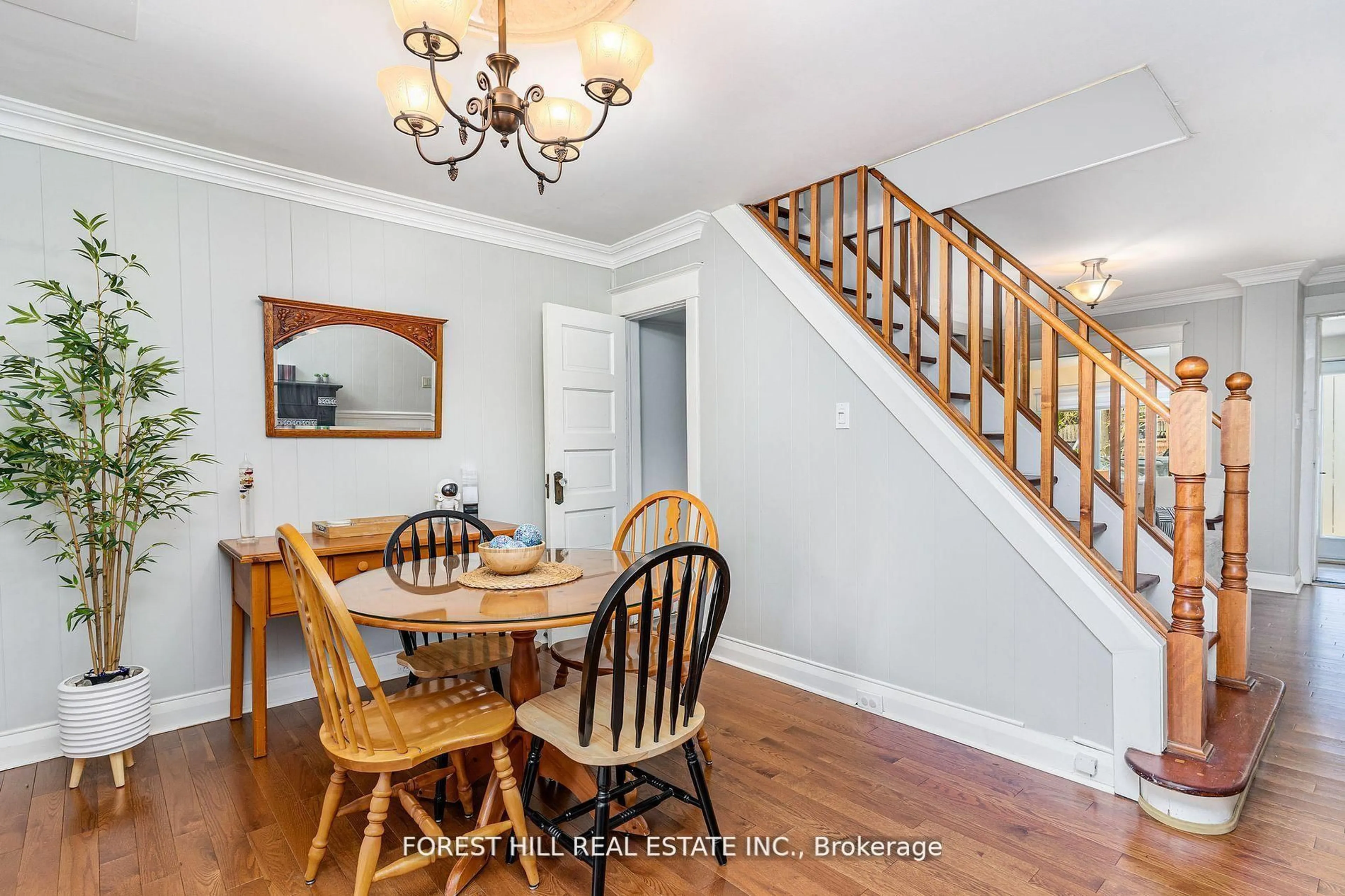 Dining room, wood/laminate floor for 91 Alton Ave, Toronto Ontario M4L 2M3