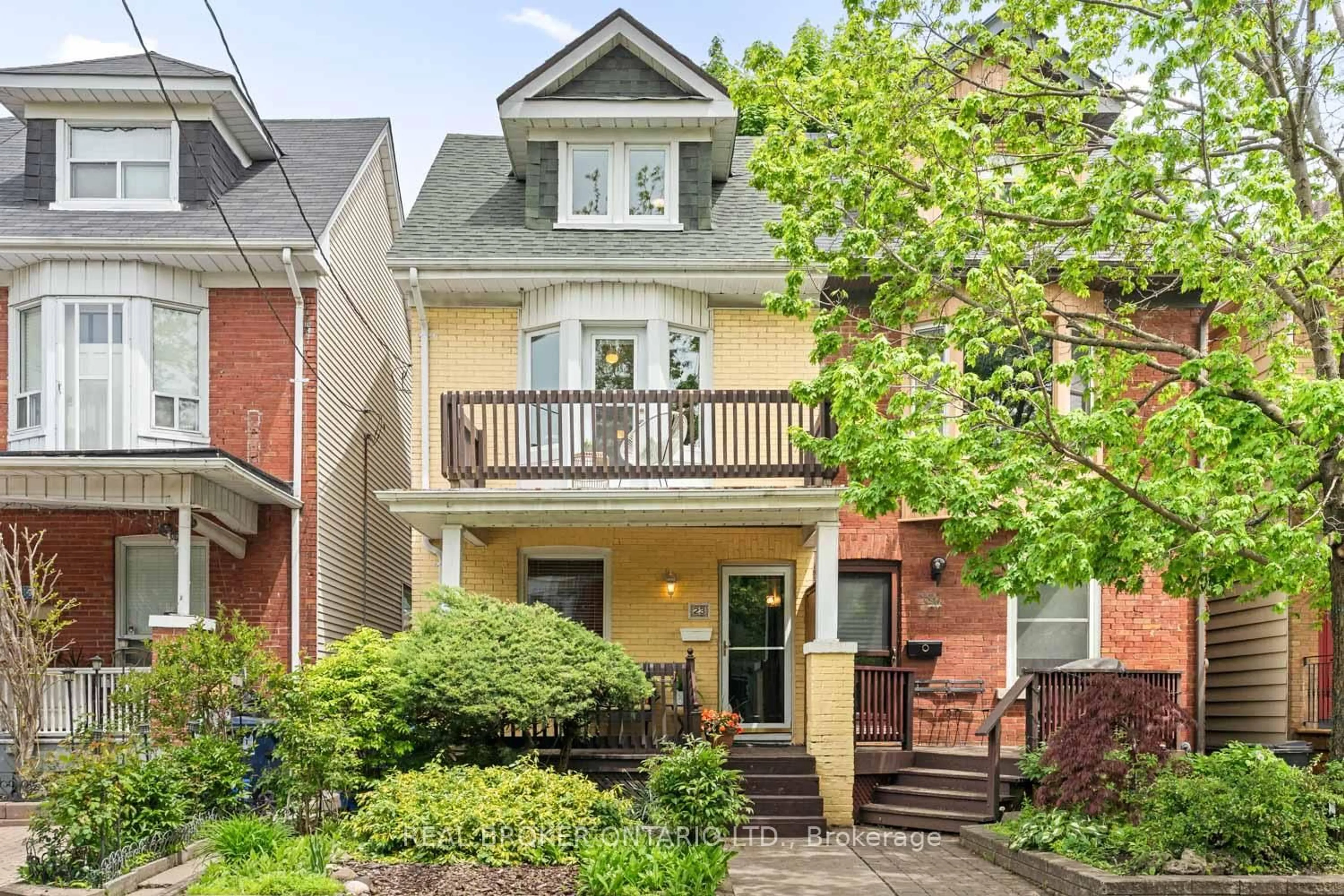 Home with brick exterior material, street for 23 Muriel Ave, Toronto Ontario M4J 2X8