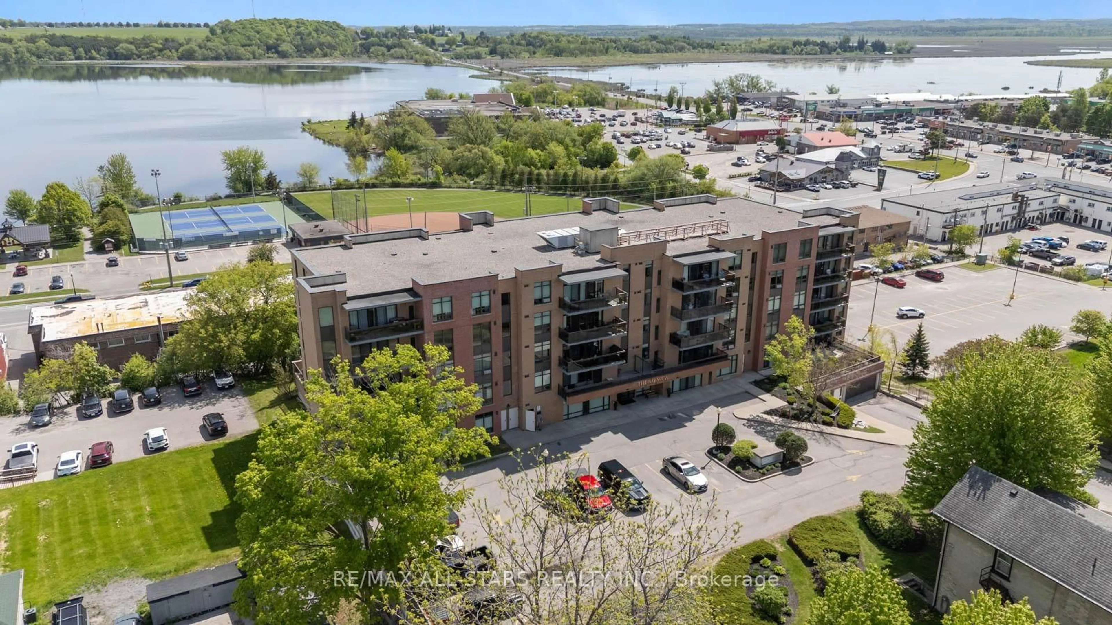 A pic from outside/outdoor area/front of a property/back of a property/a pic from drone, water/lake/river/ocean view for 171 Shanly St #408, Scugog Ontario L9L 0A3