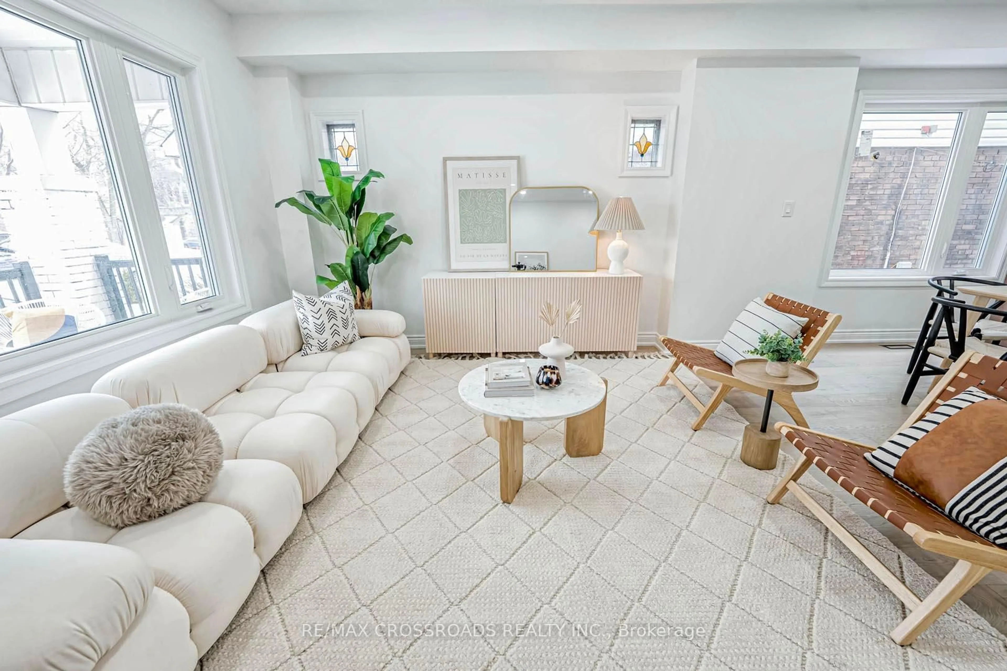 Living room with furniture, ceramic/tile floor for 548 Glebeholme Blvd, Toronto Ontario M4C 1V4