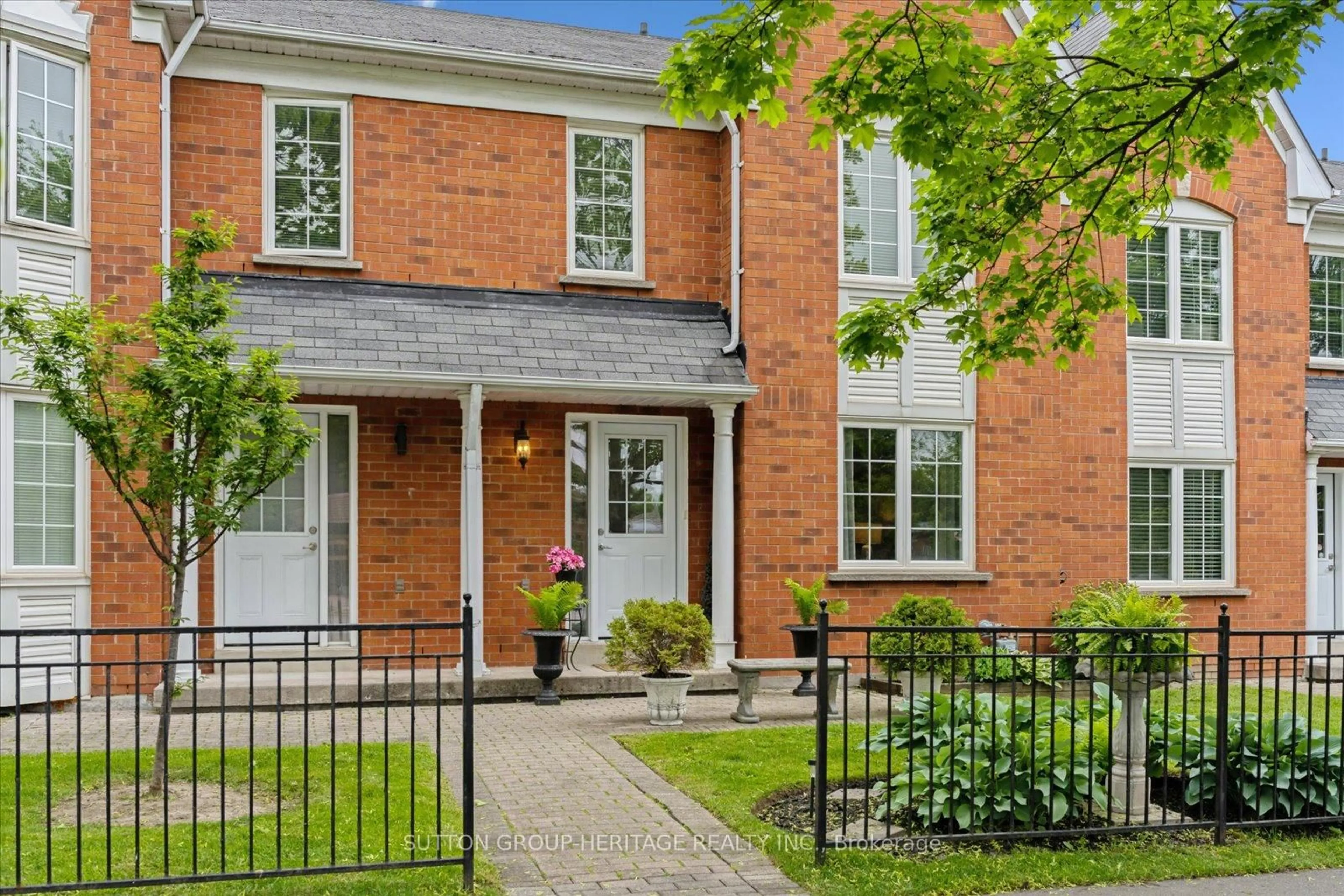 Home with brick exterior material, street for 10 Bassett Blvd #94, Whitby Ontario L1N 9C5
