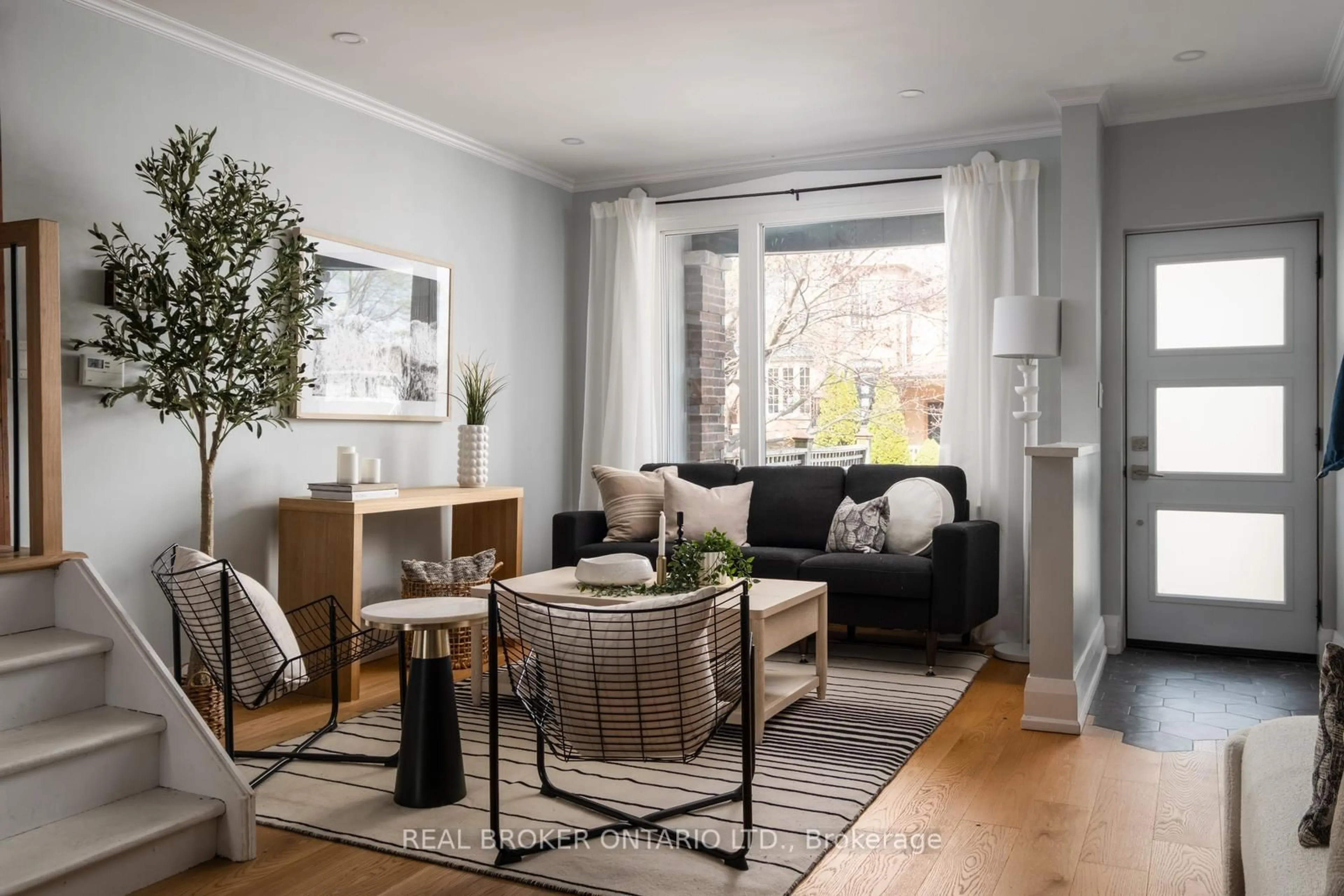 Living room with furniture, wood/laminate floor for 158 Golfview Ave, Toronto Ontario M4E 2K5