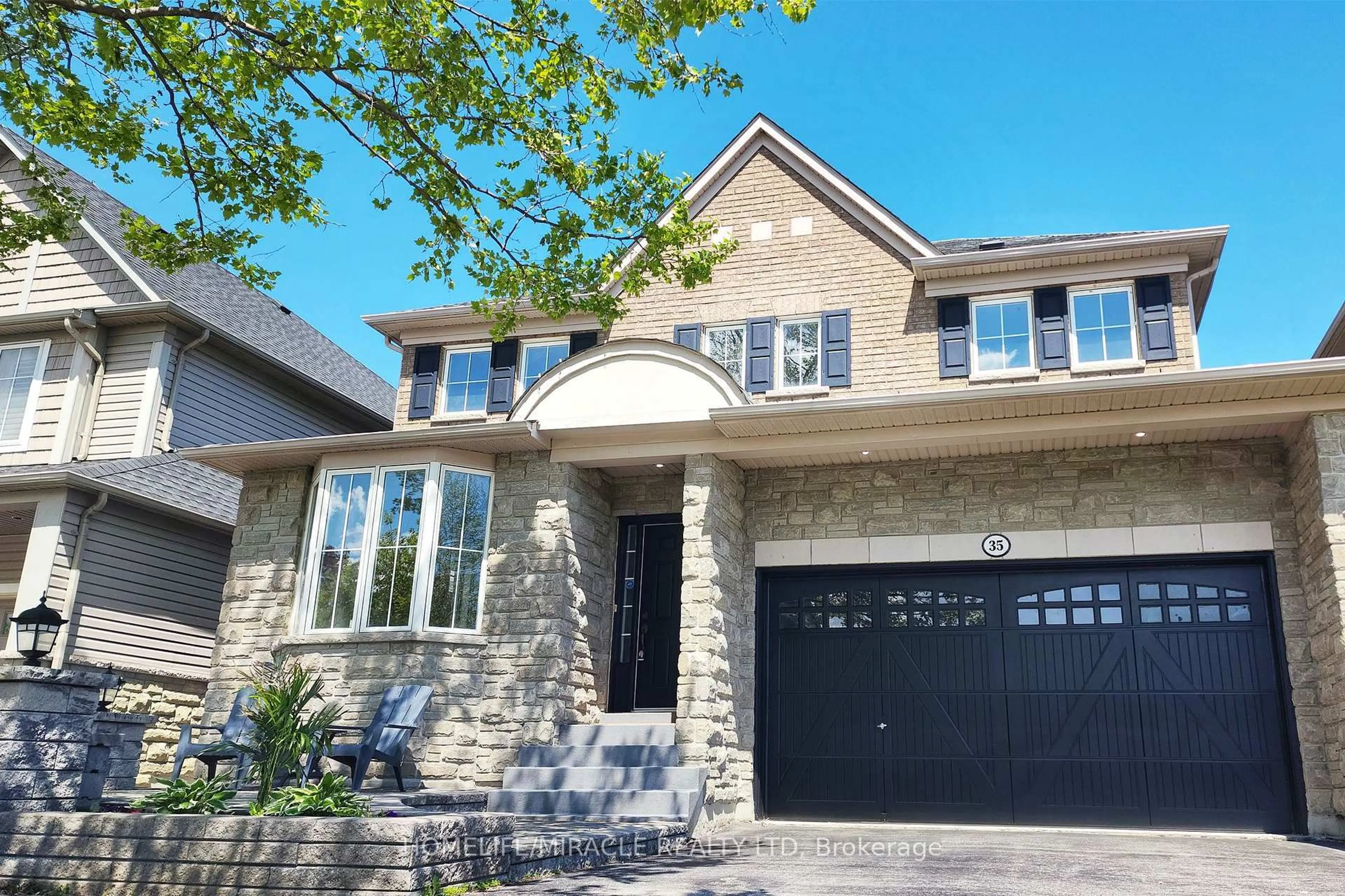 Home with brick exterior material, street for 35 Rushbrooke Way, Ajax Ontario L1Z 2C4