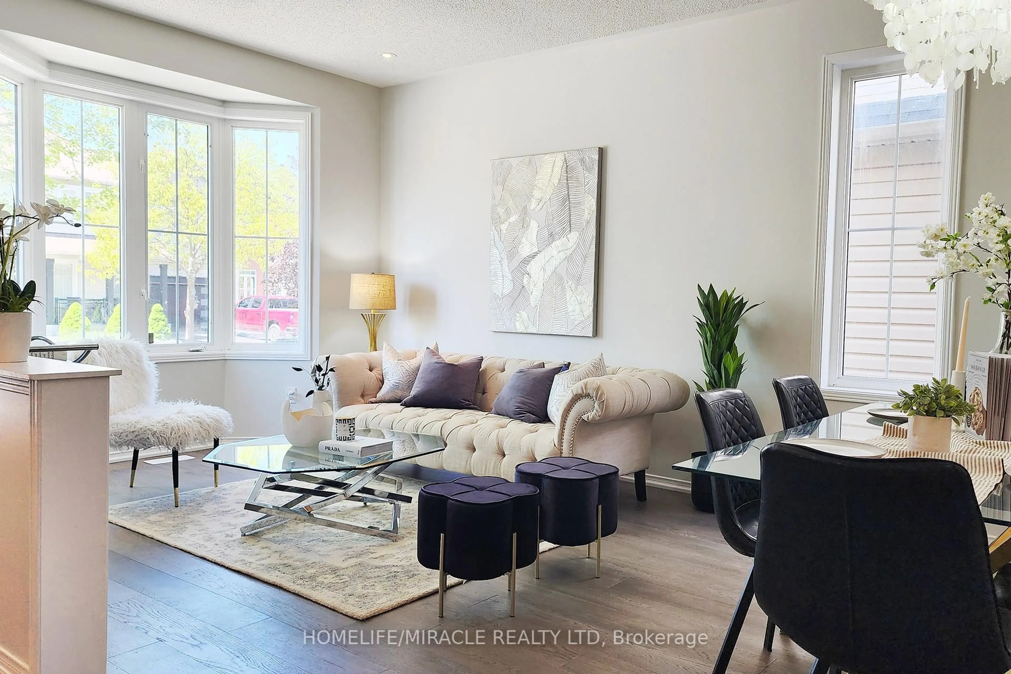 Living room with furniture, wood/laminate floor for 35 Rushbrooke Way, Ajax Ontario L1Z 2C4