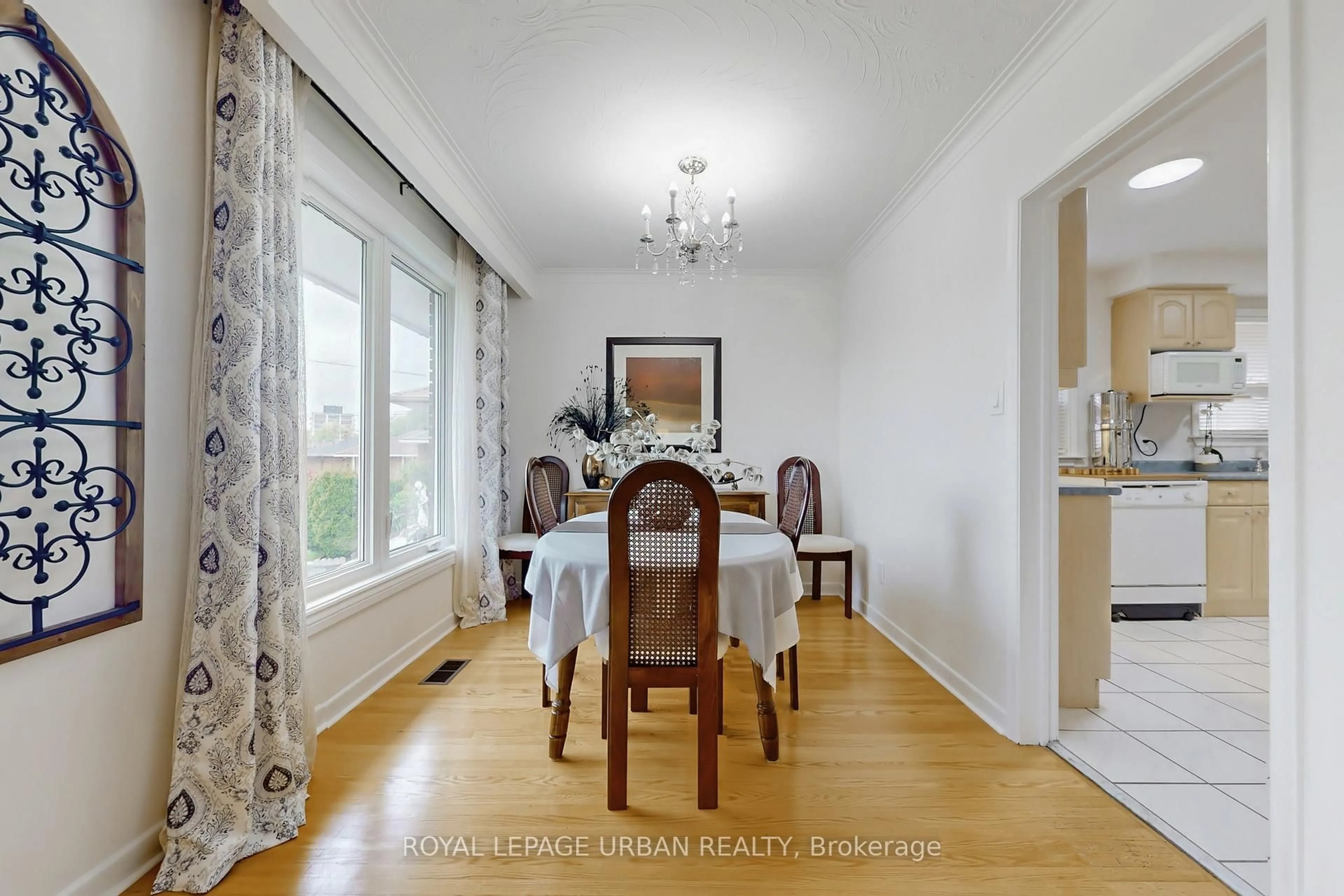 Dining room, wood/laminate floor for 98 Silvio Ave, Toronto Ontario M1K 1V3