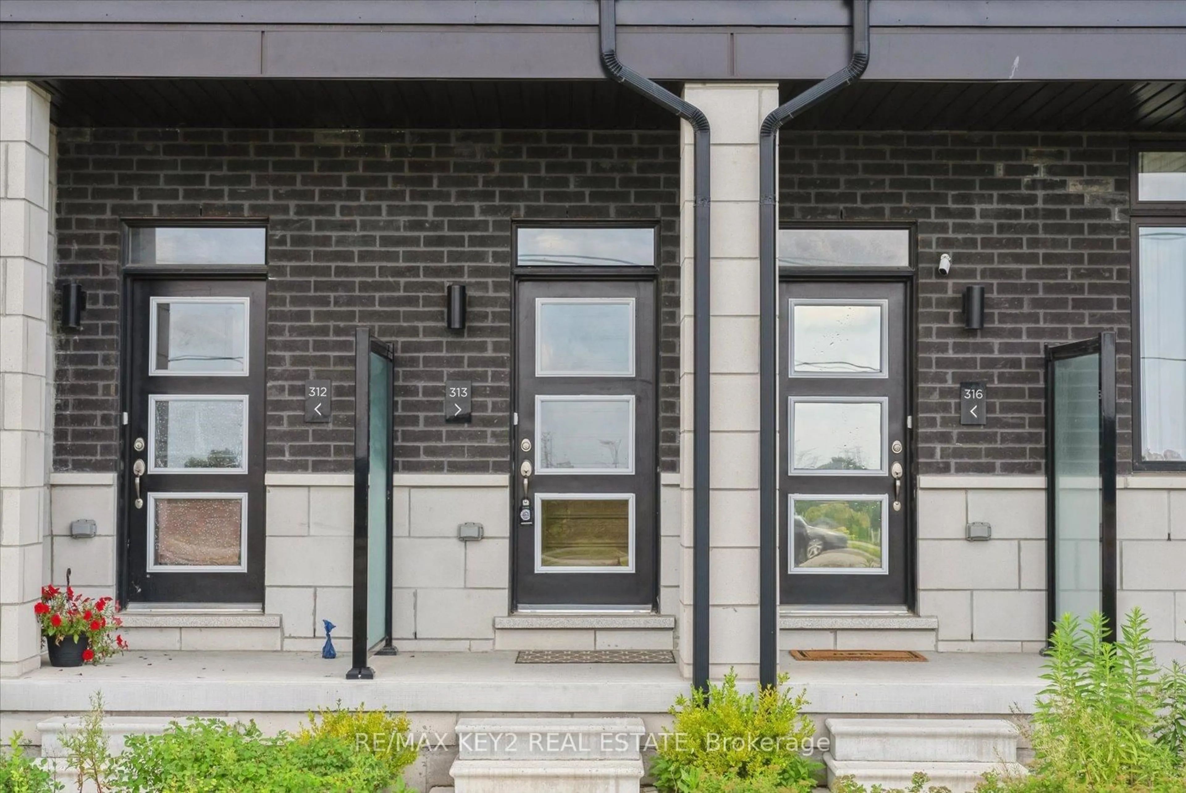 Home with brick exterior material, street for 2550 Castlegate Crossing N/A #313, Pickering Ontario L1X 0H6