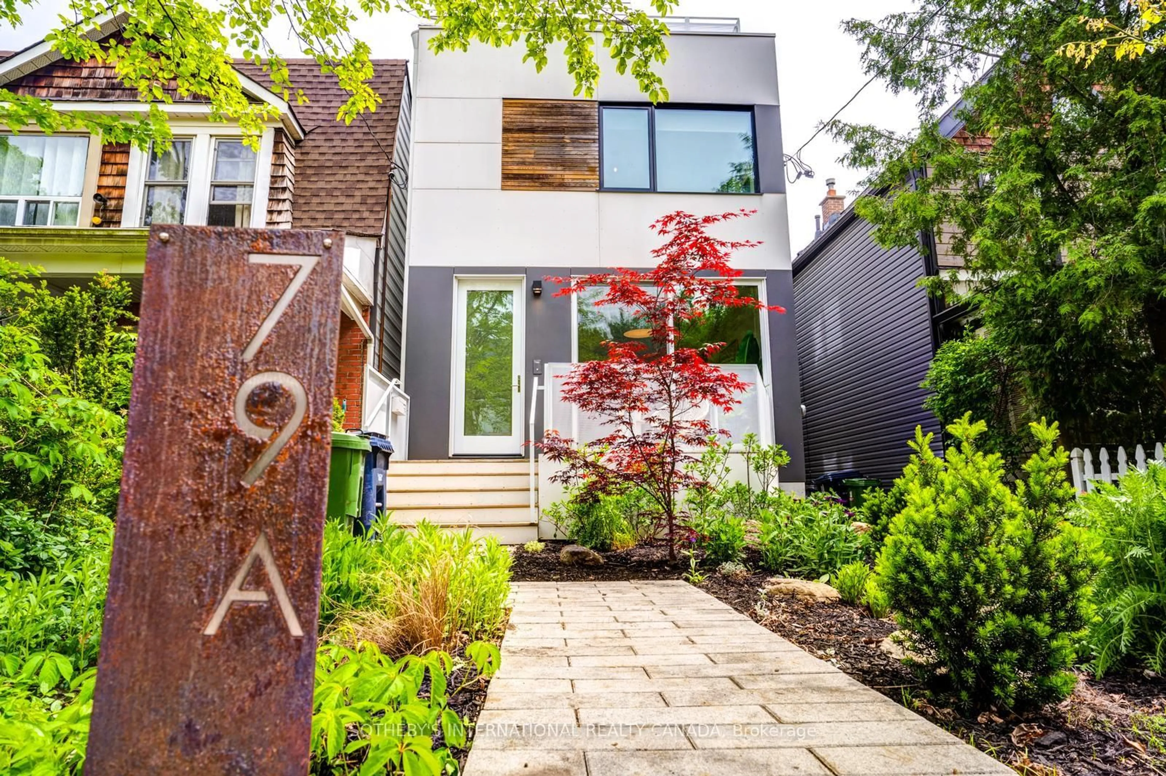 Home with brick exterior material, street for 79 Eaton Ave #1, Toronto Ontario M4J 2Z4