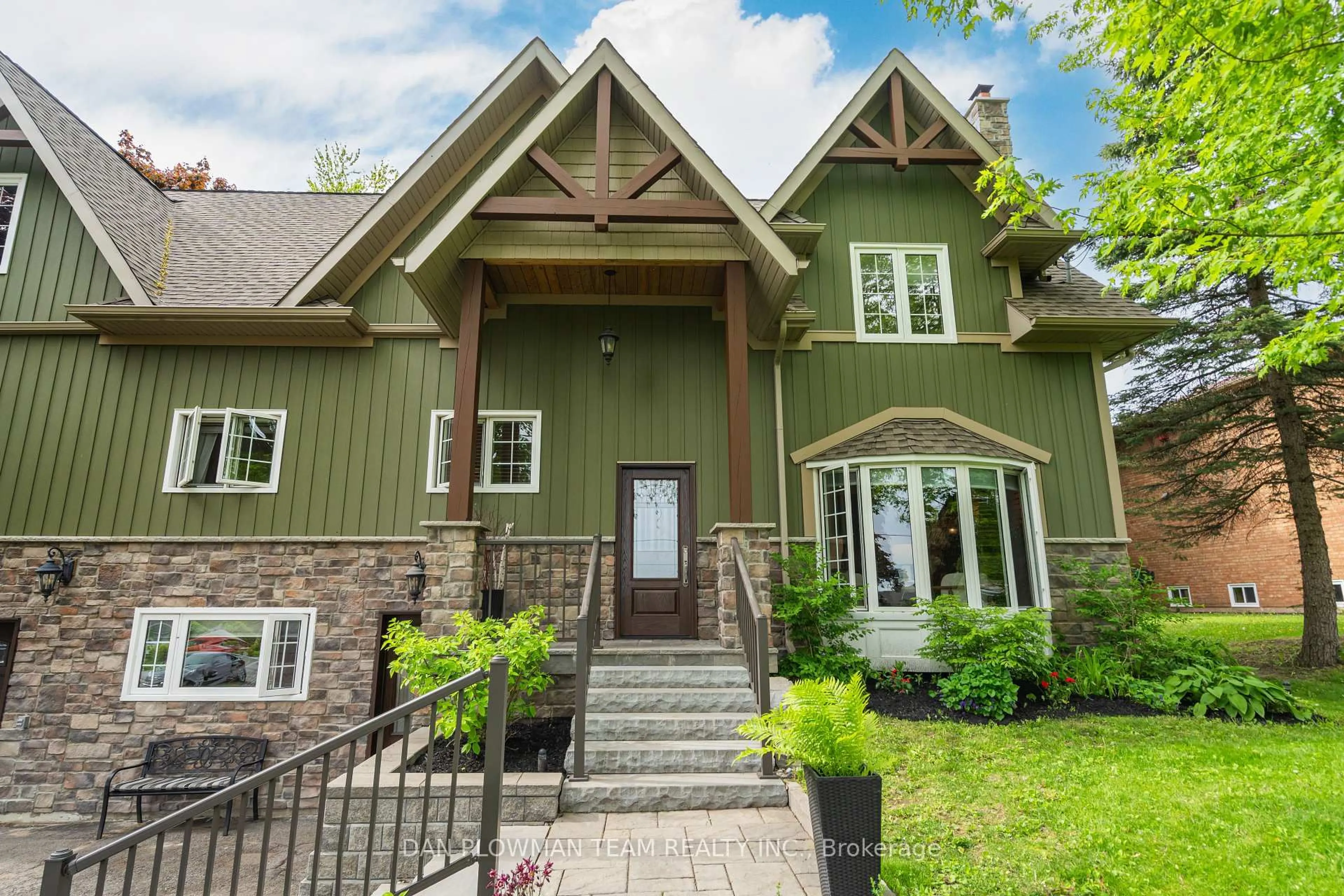 Home with vinyl exterior material, street for 28 Bradley Blvd, Clarington Ontario L0B 1J0