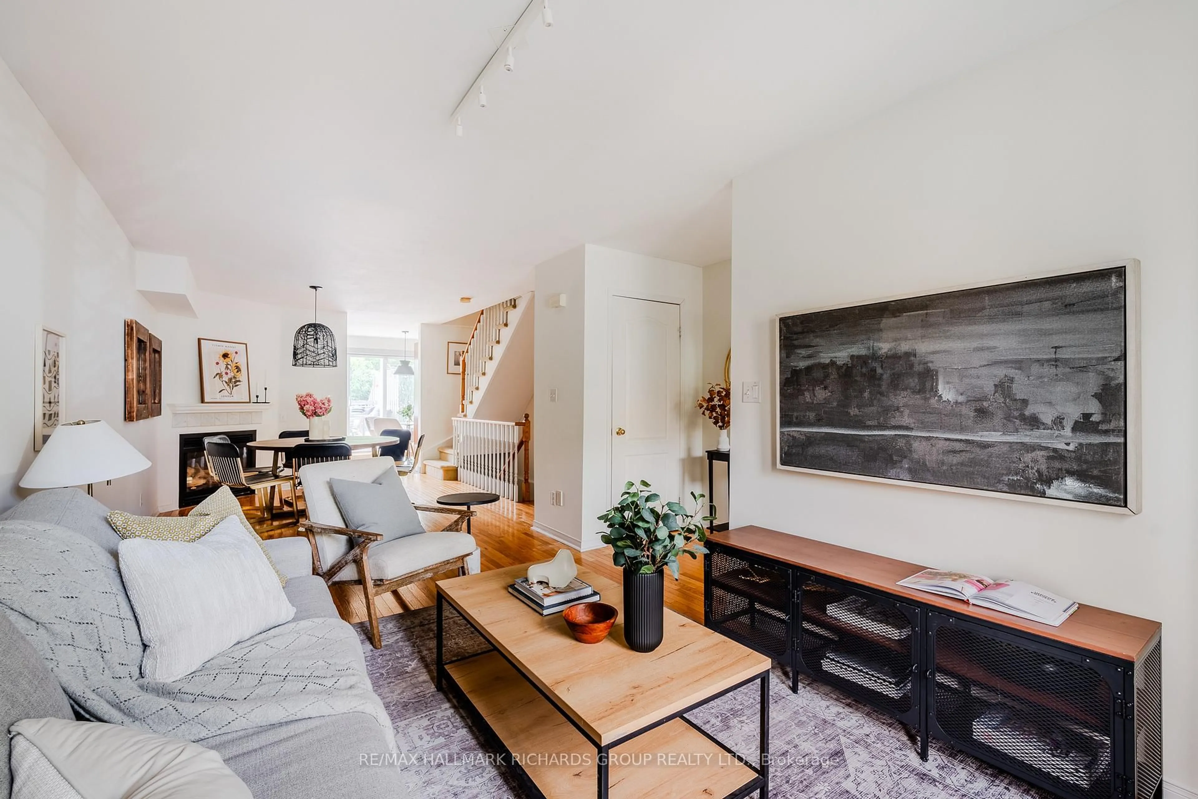 Living room with furniture, unknown for 17 Brick Crt, Toronto Ontario M4L 3X7