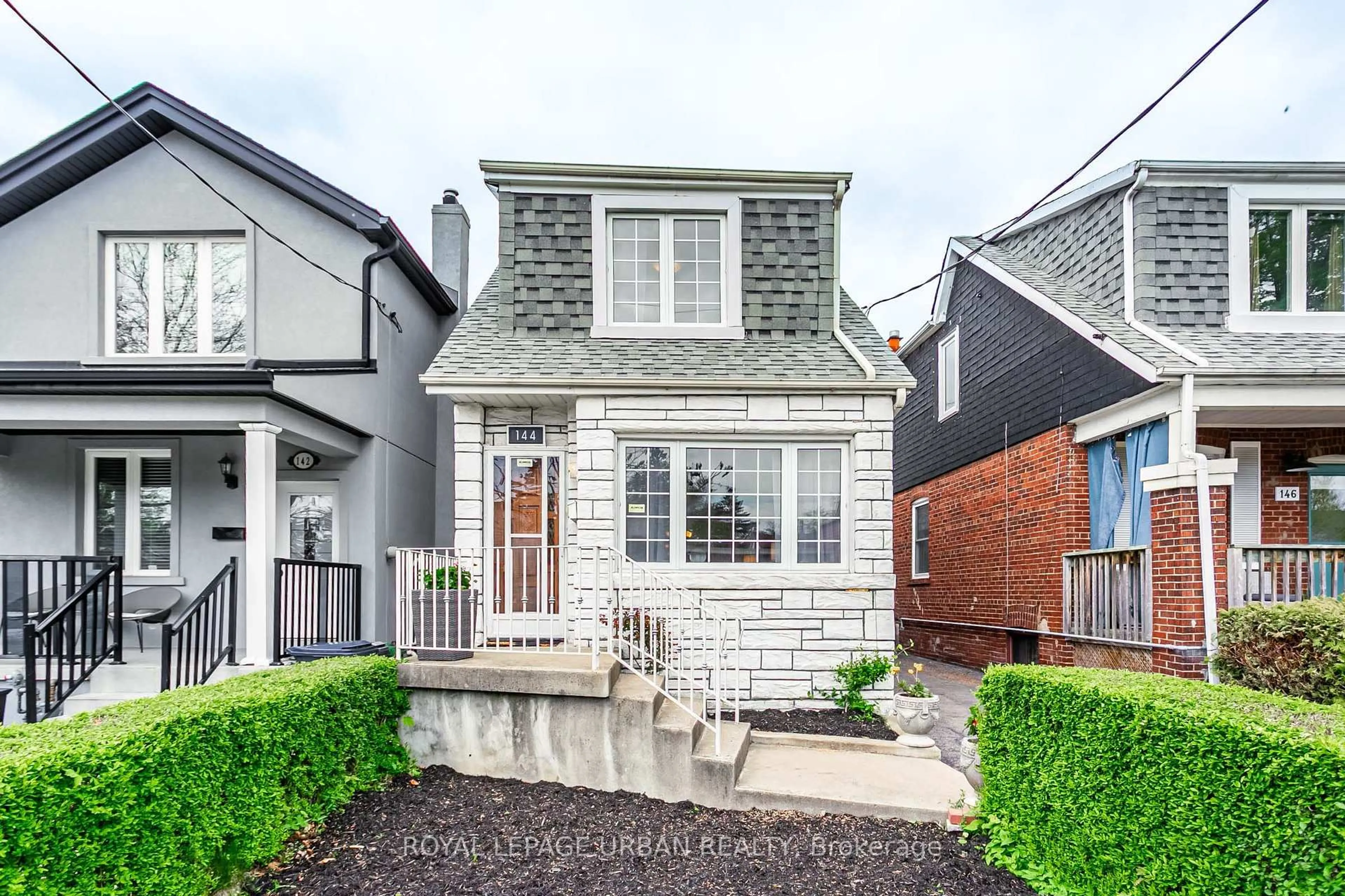 Home with brick exterior material, street for 144 Aldwych Ave, Toronto Ontario M4J 1X6